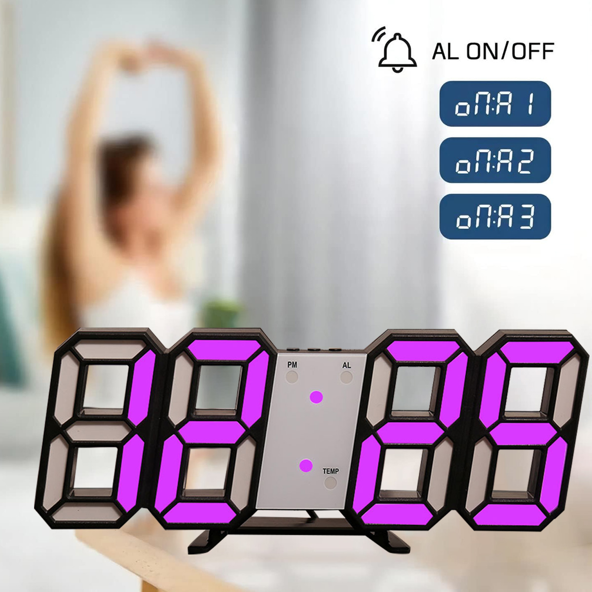 Digitaluhr mit rosa Zahlen. Die Uhr hat einen schwarzen Rahmen und steht auf einer Holzoberfläche. Bedienelemente sind beschriftet.
