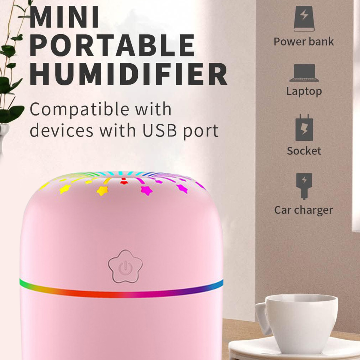 Ein rosa Mini-Luftbefeuchter mit Regenbogenlicht, einem Ein-Aus-Knopf und verschiedenen kompatiblen Geräten.