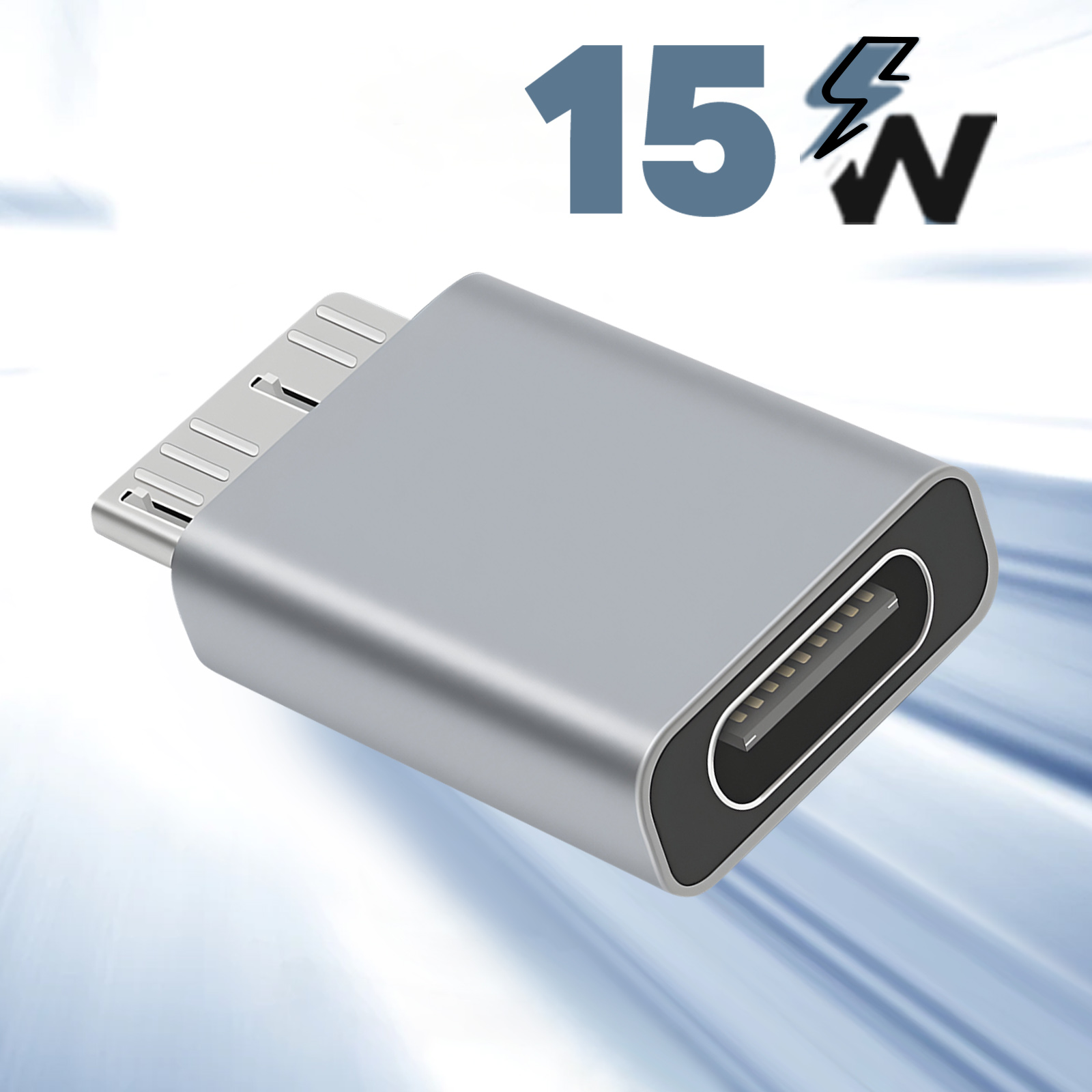 Un adattatore da USB-C a Micro USB argentato. Ha una porta USB-C e un connettore Micro USB.