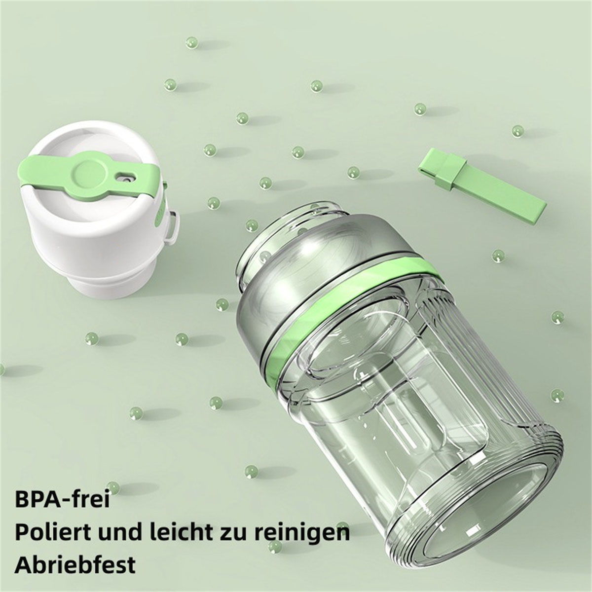 Transparenter Kunststoff-Shaker mit grünem Deckel und Deckel. Grüne Perlen sind verstreut.