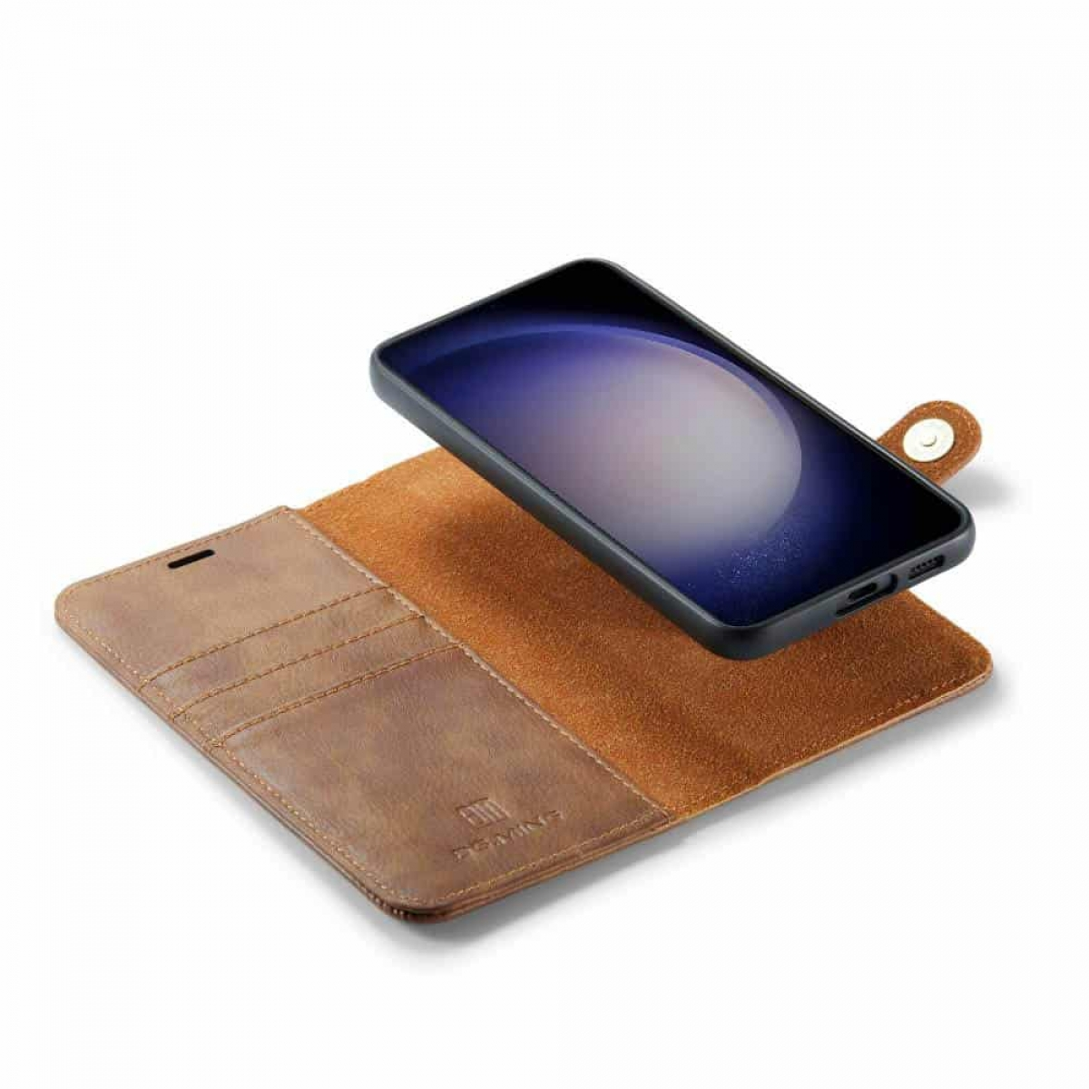 Ein Telefon in einer braunen Hülle, offen liegend, mit einem schwarzen Telefon sichtbar.