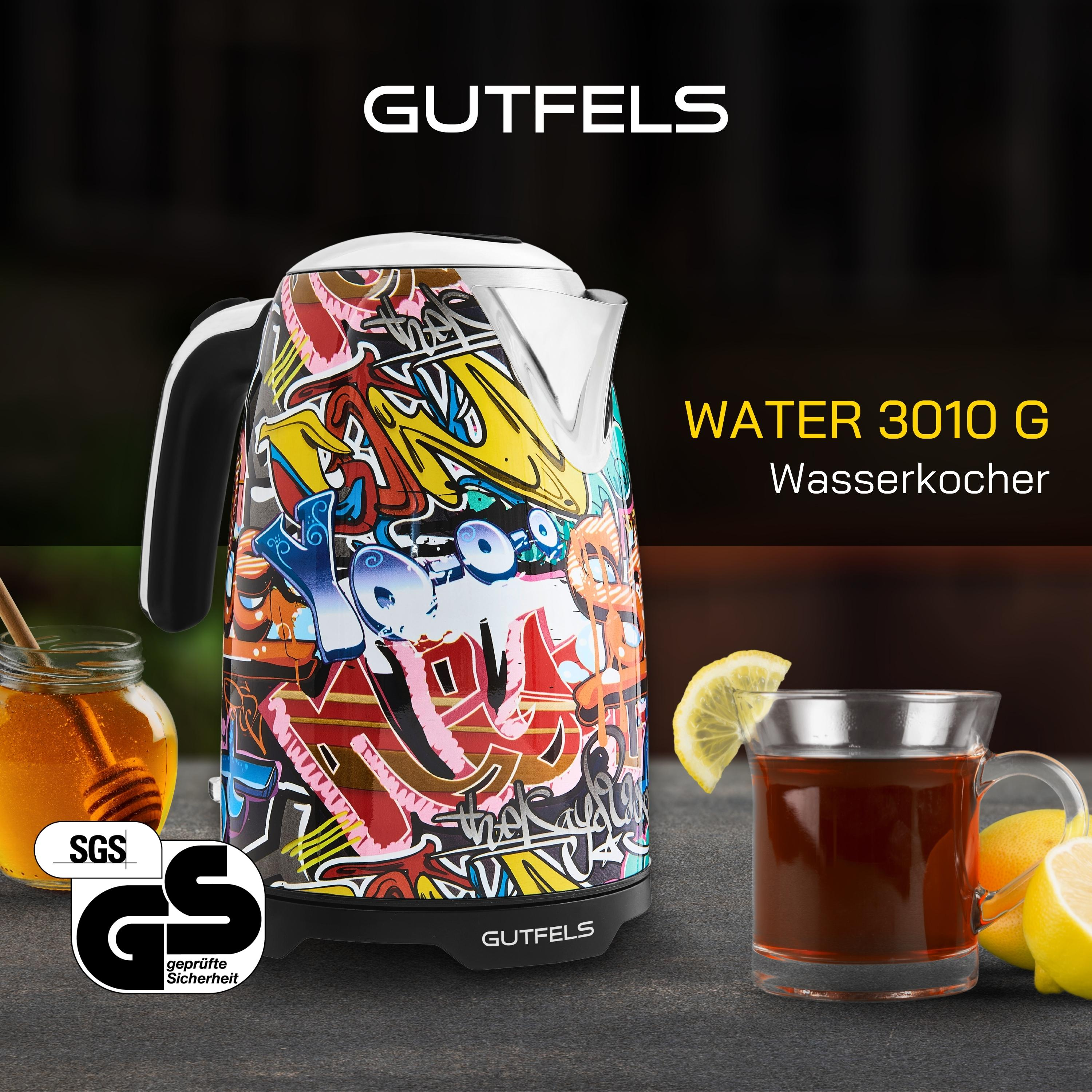 Ein lebhafter, mit Graffiti bedeckter Wasserkocher mit Teetasse, Zitronen, Honig auf dem Tisch. GUTFELS-Logo.