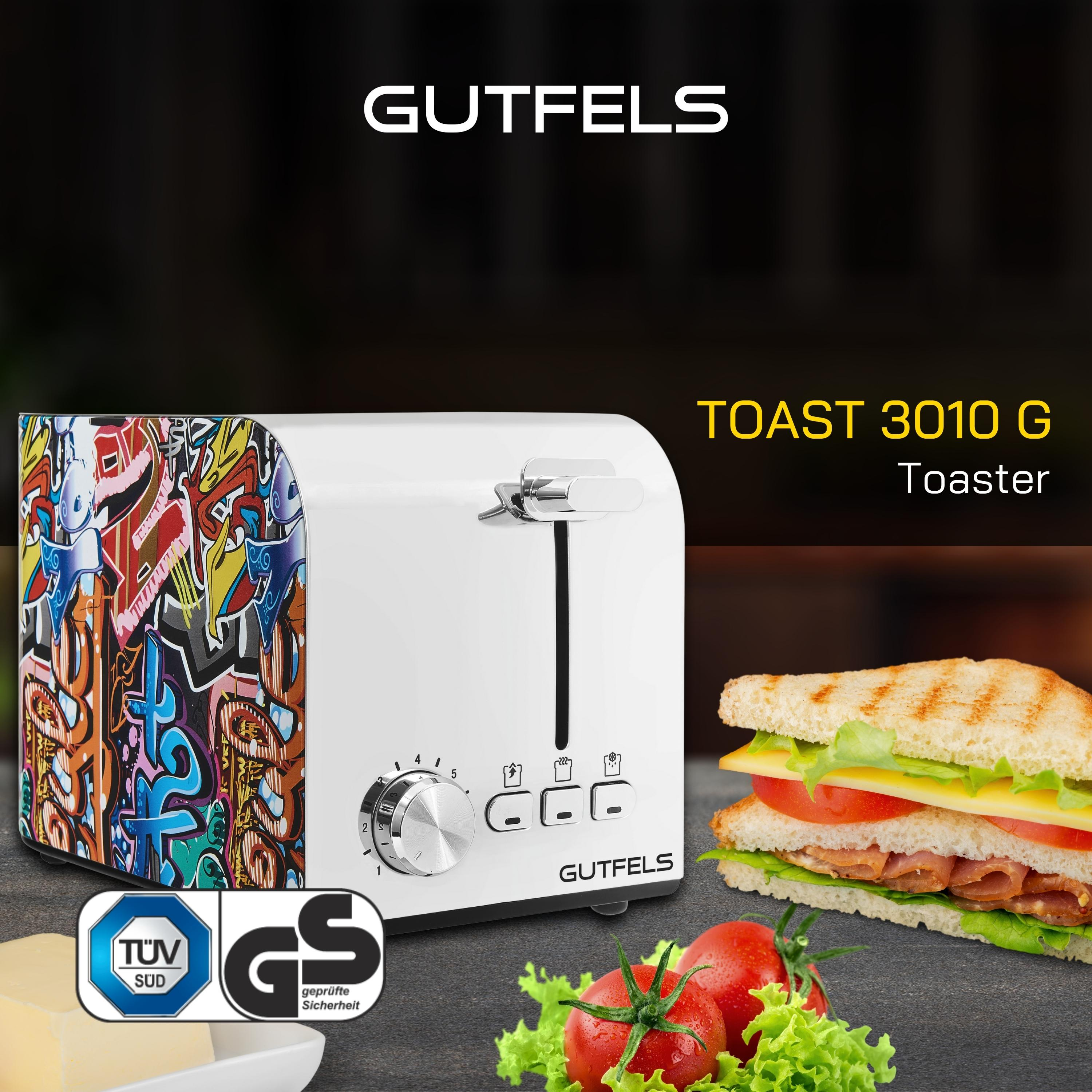 Weißer Toaster mit Graffiti-Design. Ein getoastetes Sandwich und Zutaten sind in der Szene.