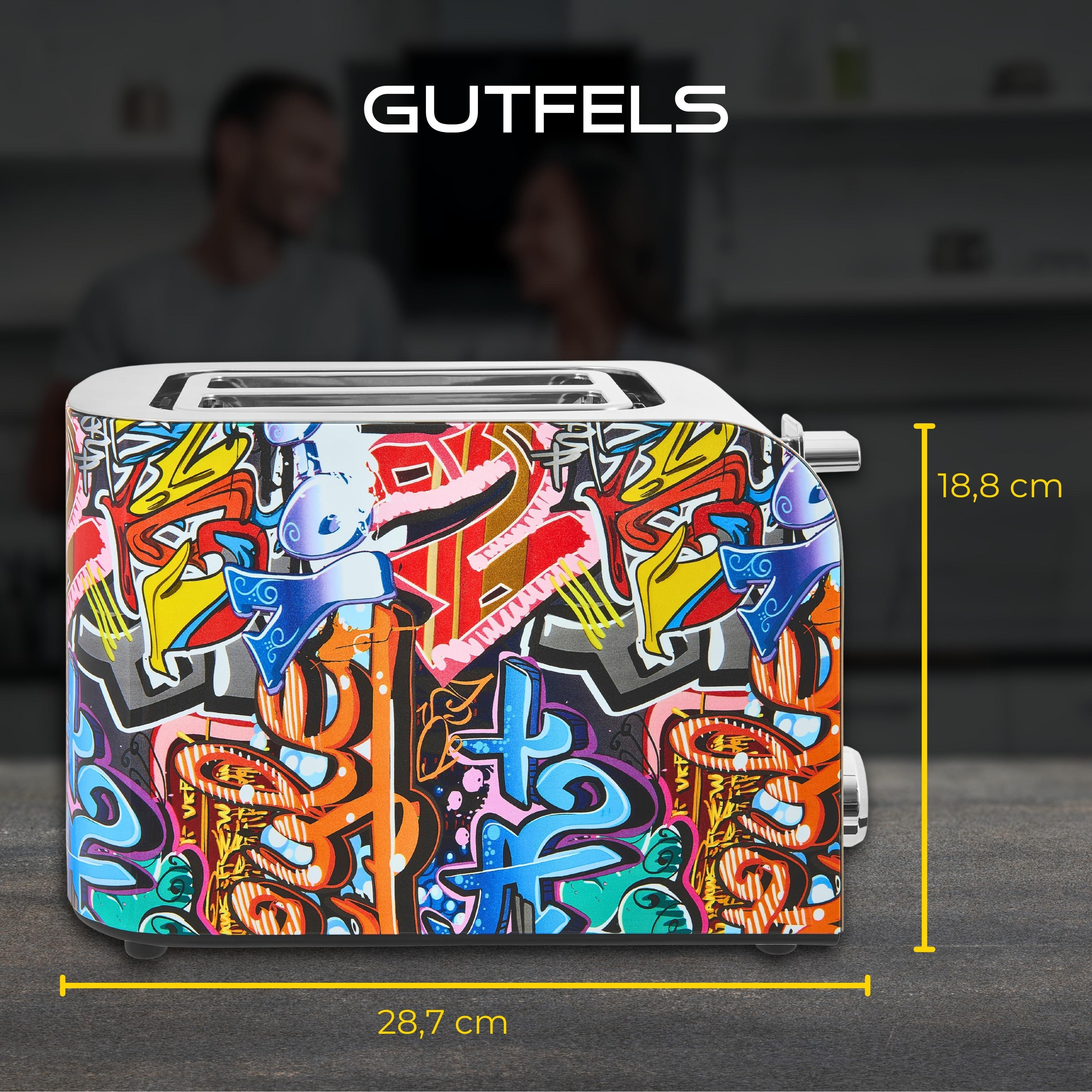 Mit Graffiti bedeckter Toaster mit Abmessungen und Gutfels-Logo, auf einer Arbeitsplatte.