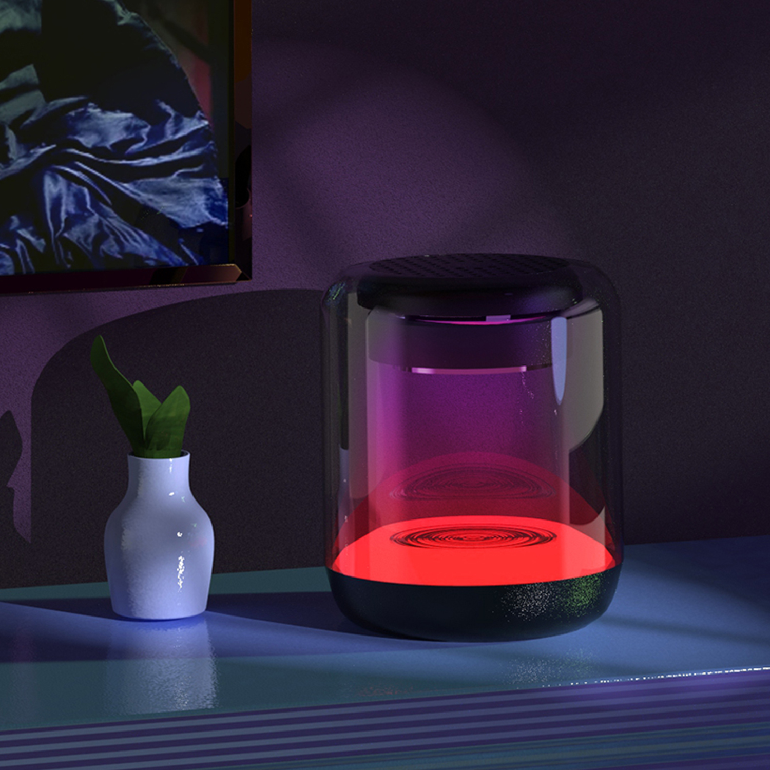 Un altoparlante cilindrico con una luce in basso. Un vaso con una pianta è a sinistra.