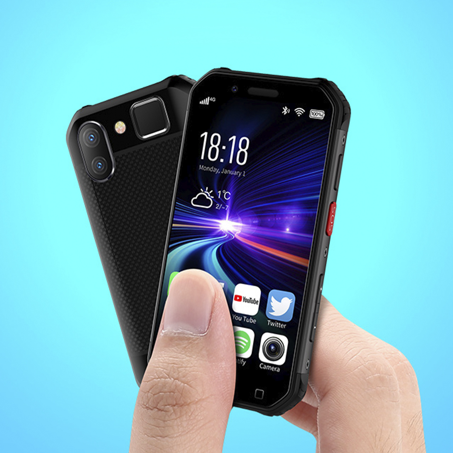 Mini smartphone nero tenuto in mano, che mostra una schermata iniziale.