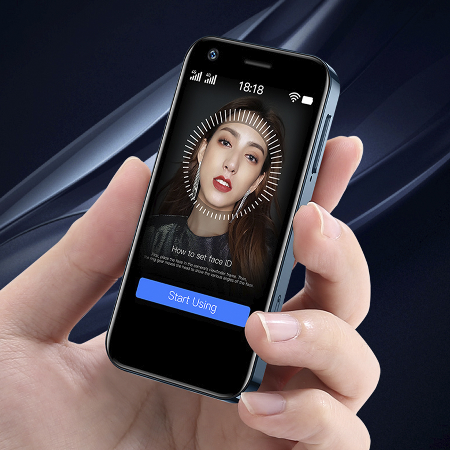 Hand, die ein kleines Smartphone mit Frauenbild und Anweisungen für Face ID hält.