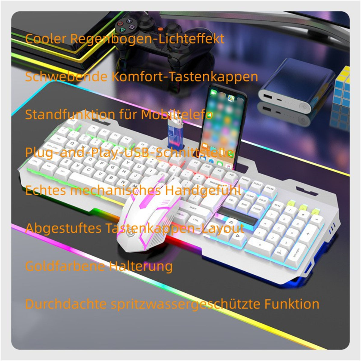 Ein Schreibtisch mit Tastatur, Maus und Telefon. Text auf Deutsch. Es gibt auch eine Spielkonsole und eine Powerbank.