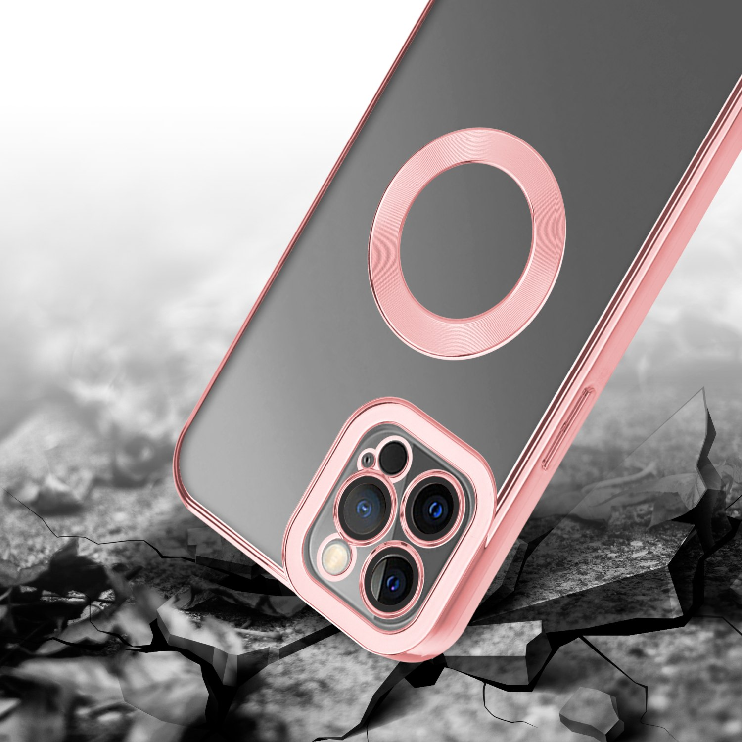 Nahaufnahme einer Handyhülle mit pinkfarbenem Rahmen und durchsichtigem Rücken. Telefon auf zerbrochener Oberfläche.