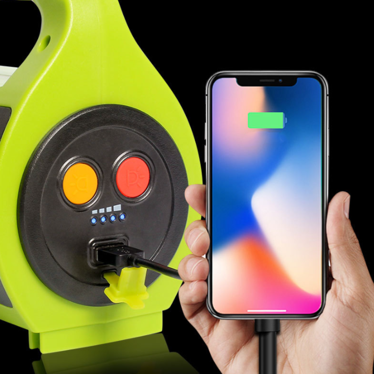 Eine grüne Powerstation, die ein Telefon auflädt. Das Telefon hat ein Batteriesymbol.