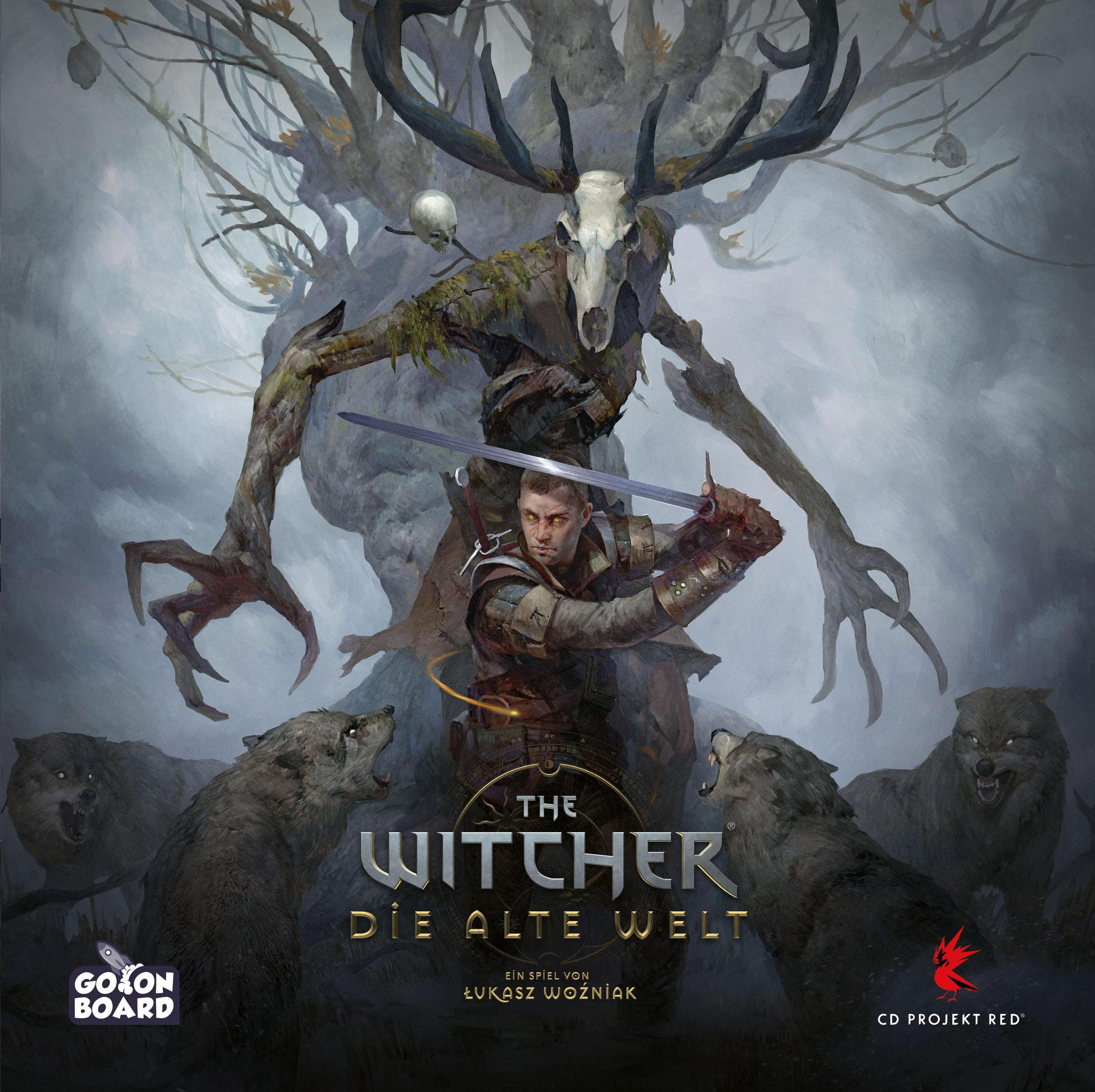 Scatola del gioco da tavolo con un mostro e lupi. Testo: The Witcher: Die Alte Welt.