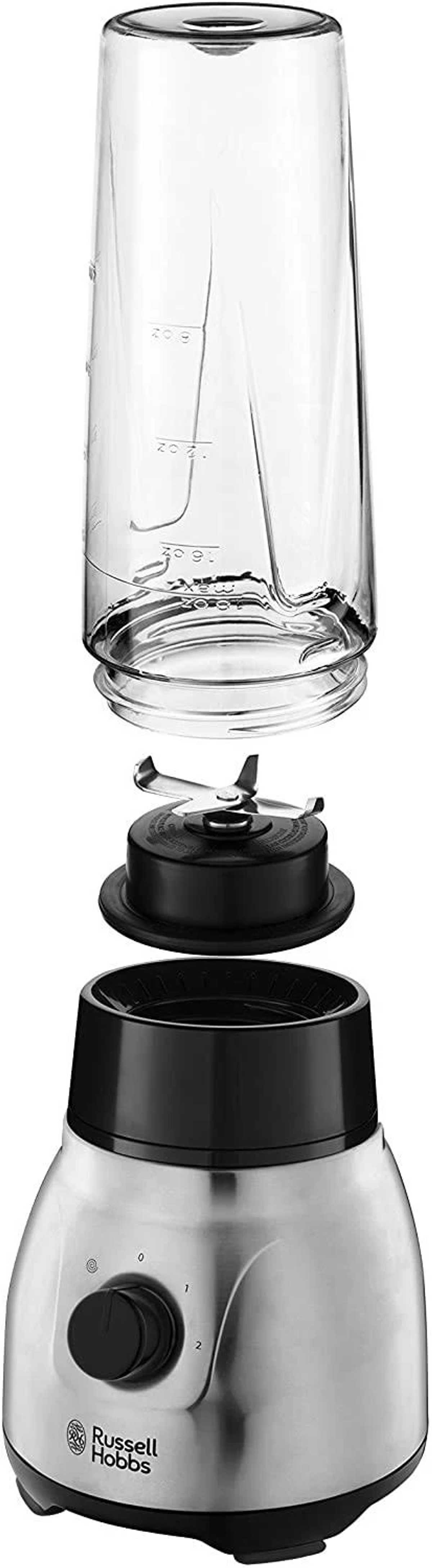 Zerlegter Mixer. Glasbehälter, Klingenbaugruppe und Motorbasis sind getrennt.