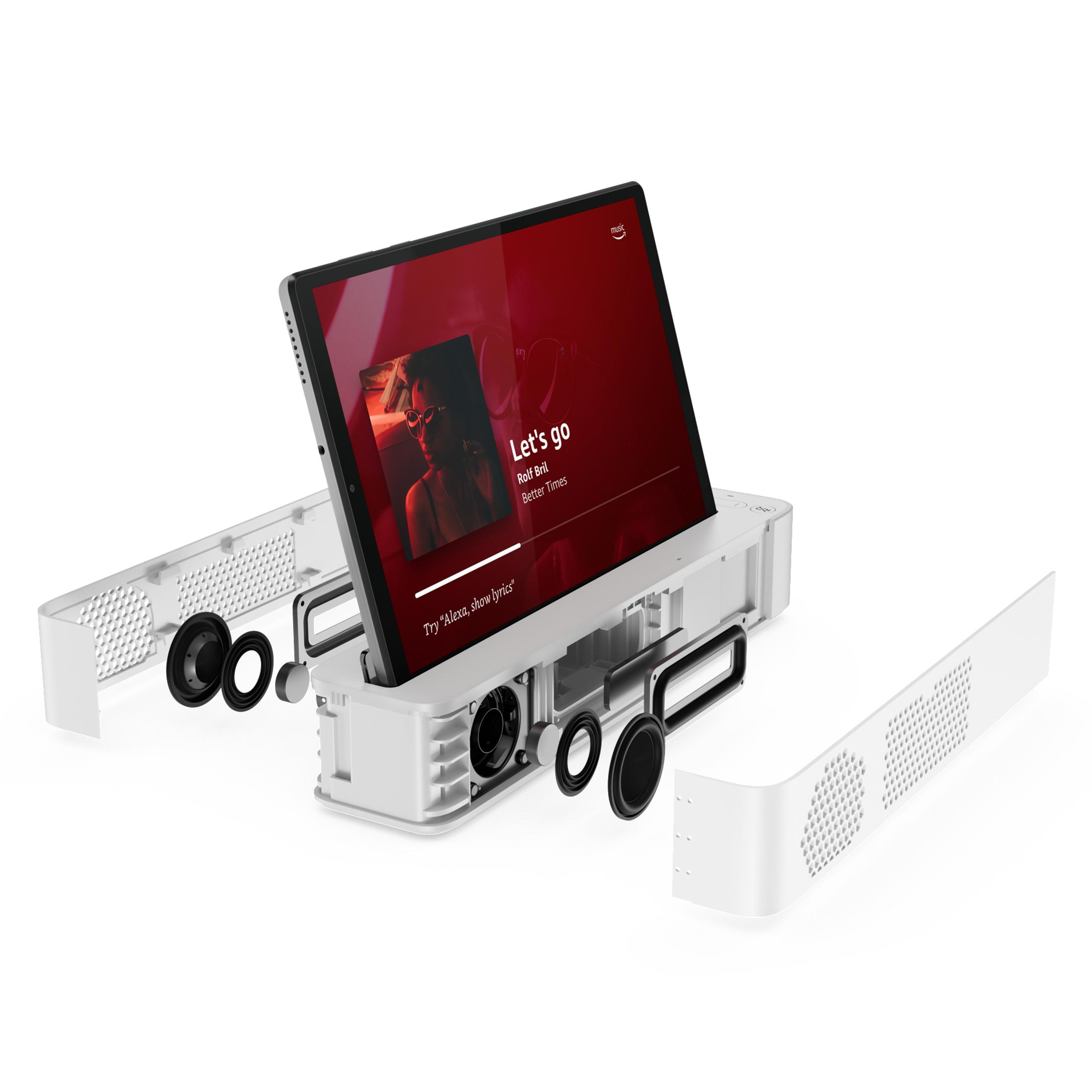 Weißes Tablet in einem Lautsprecher mit Lautsprechern und einem Bildschirm mit 'Let's go'.
