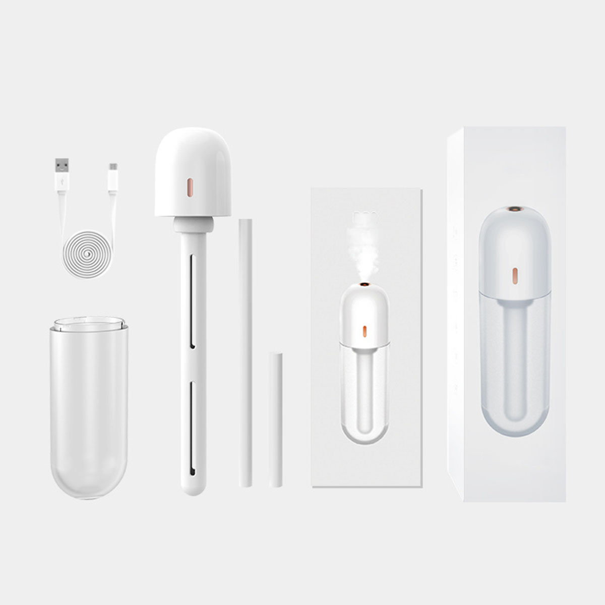 Verschiedene Teile eines weißen Luftbefeuchters: Wassertank, Diffusor und USB-Kabel.