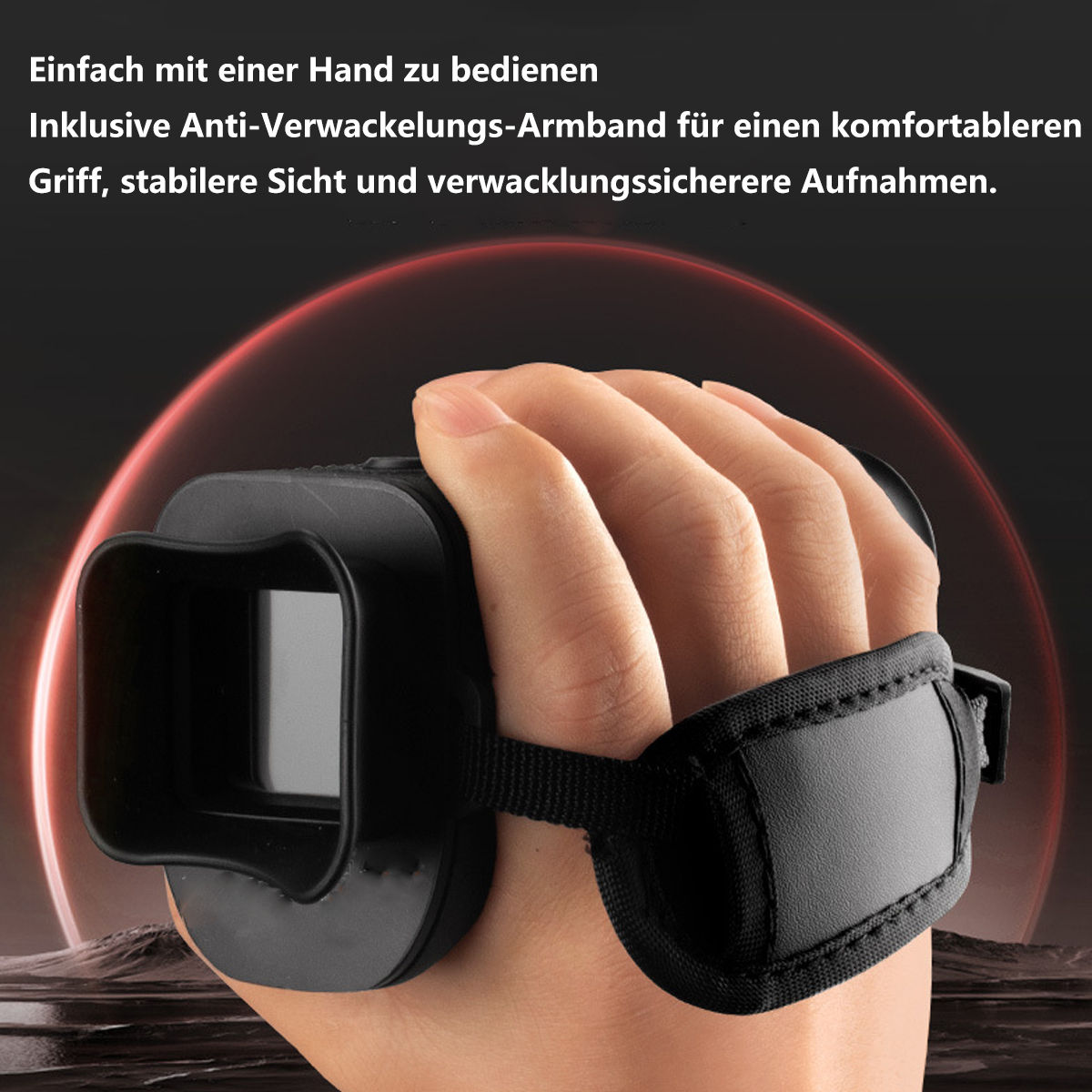 Eine Hand hält ein schwarzes Gerät mit einem Riemen. Das Gerät hat ein Sichtfenster und einen schwarzen Riemen.