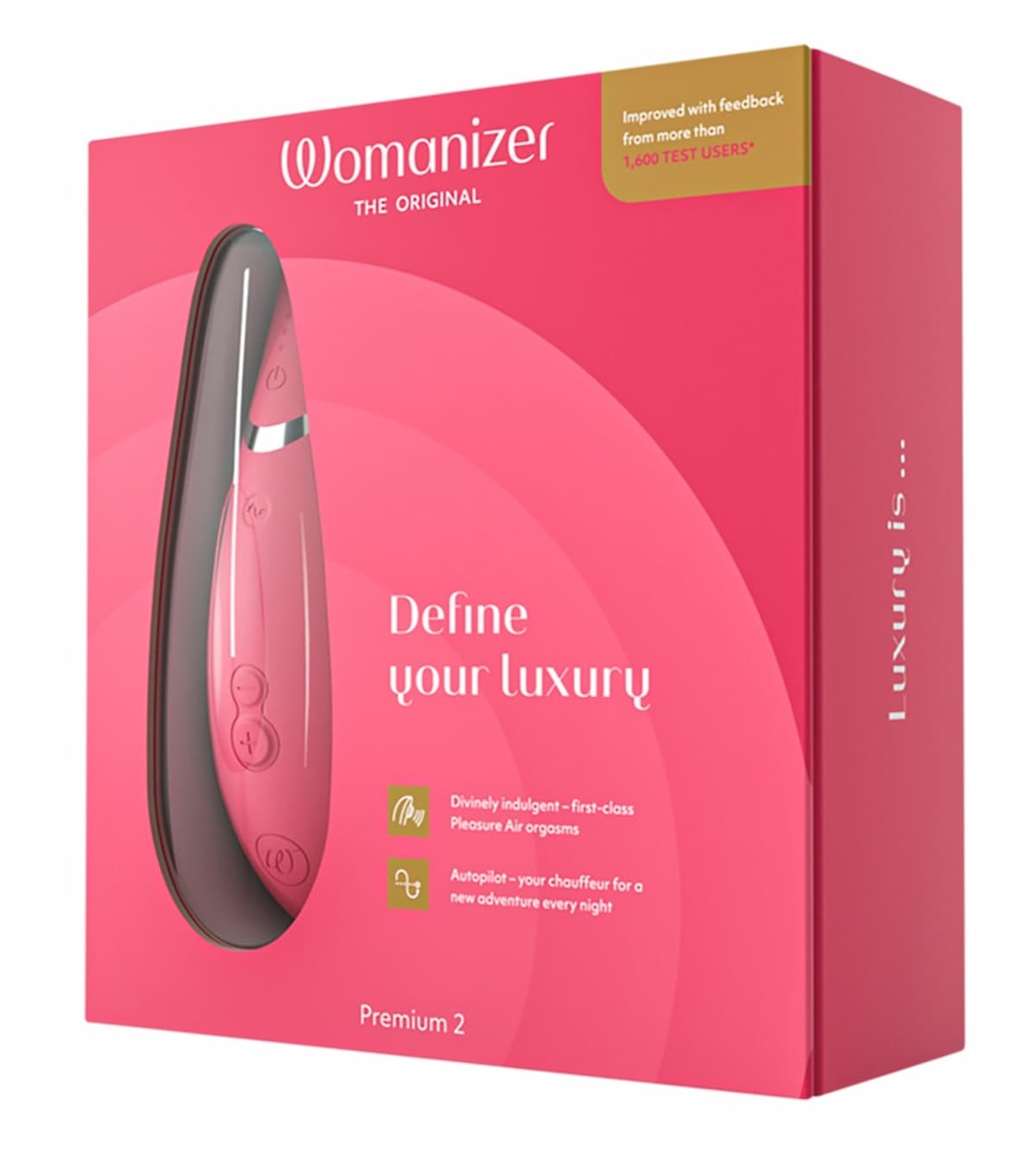 Scatola Womanizer Premium 2, rosa, con un dispositivo visibile.