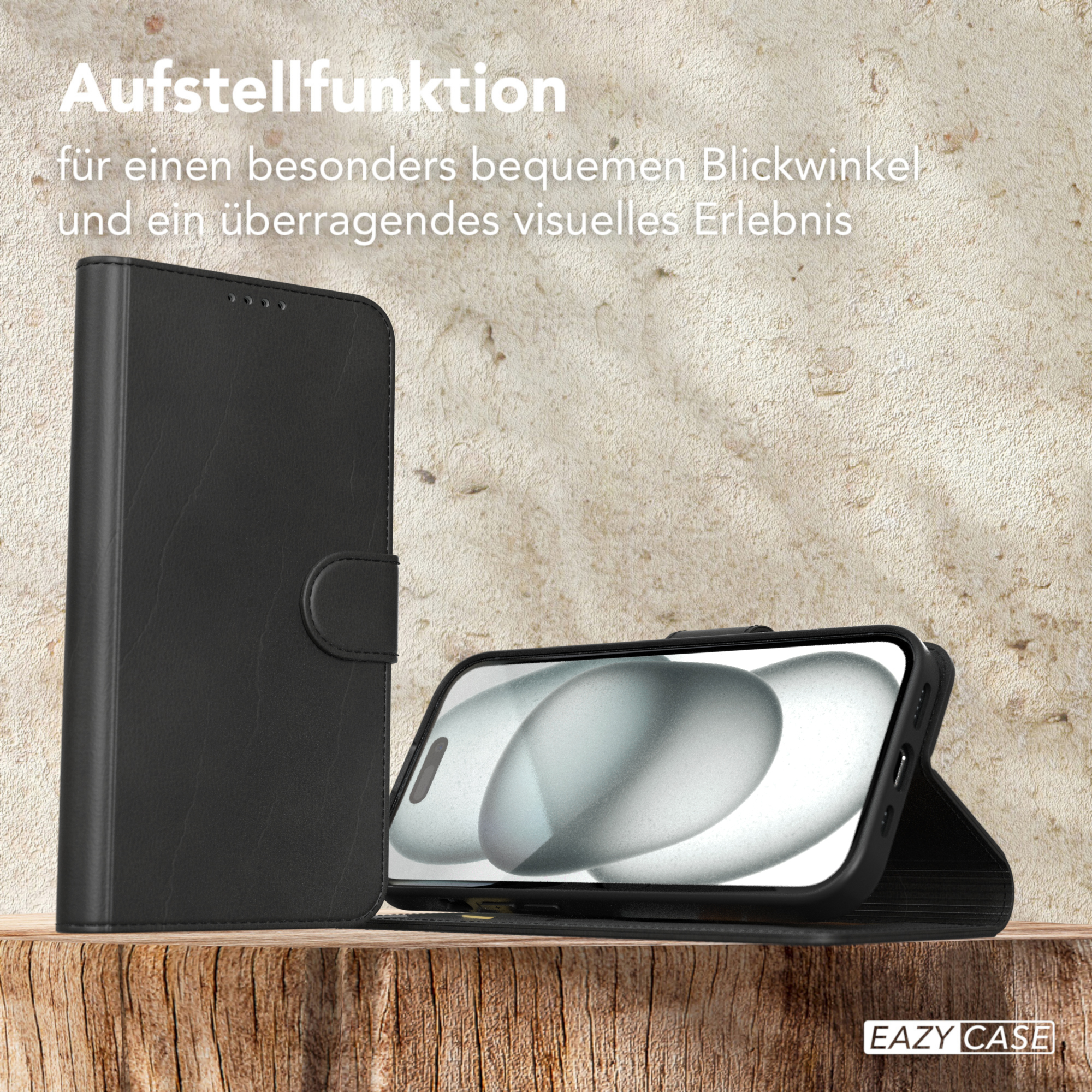 Eine schwarze Handyhülle mit Ständerfunktion, auf einer Holzoberfläche aufgestellt, mit Text.