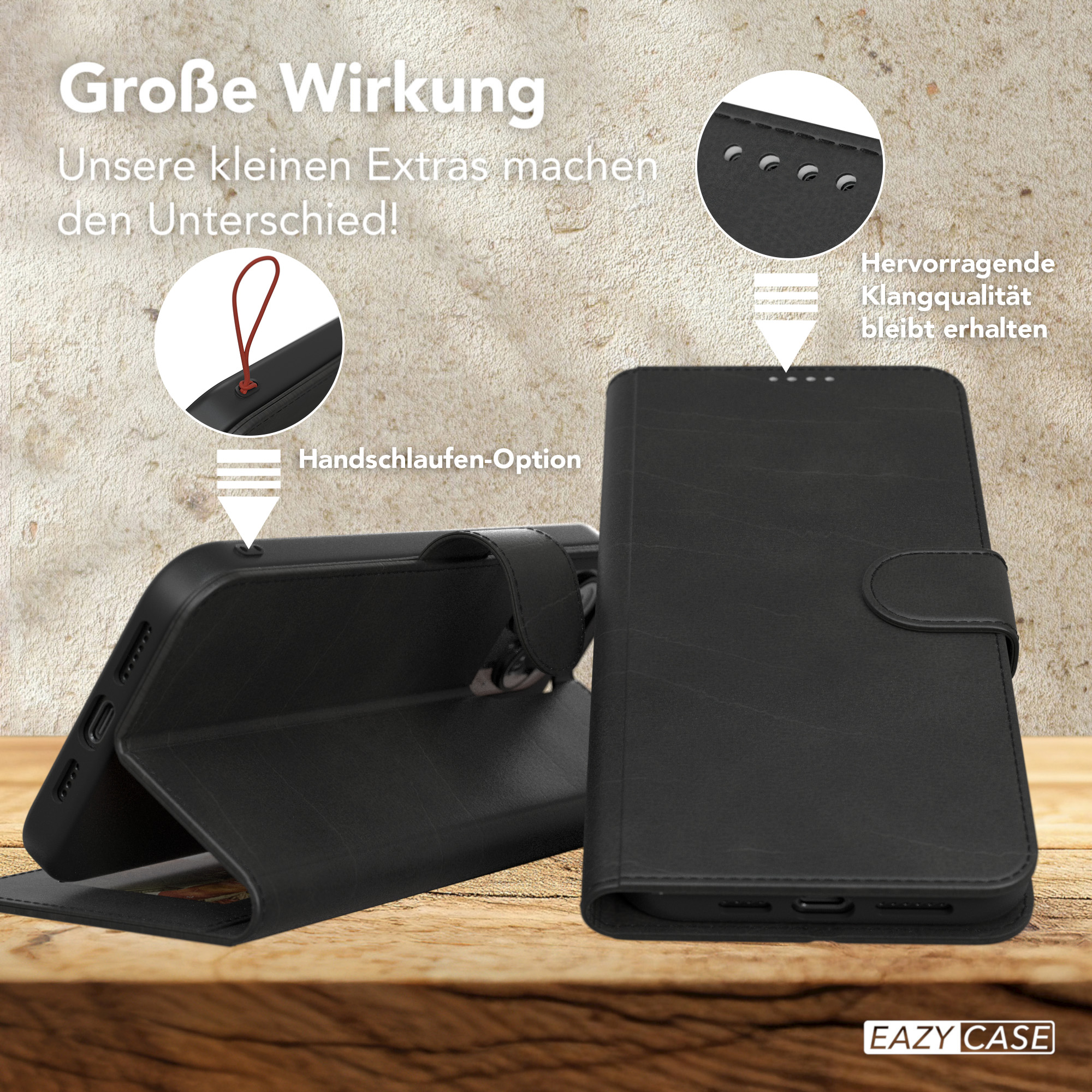 Schwarze Handyhülle mit offener Ansicht. Roter Handschlaufe. Text auf Deutsch: 'Große Wirkung'.