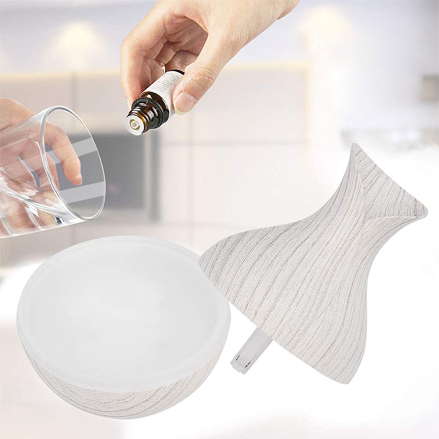 Ein ätherisches Öl wird in einen Diffusor gegossen. Der Diffusor ist weiß mit Holzmaserung.