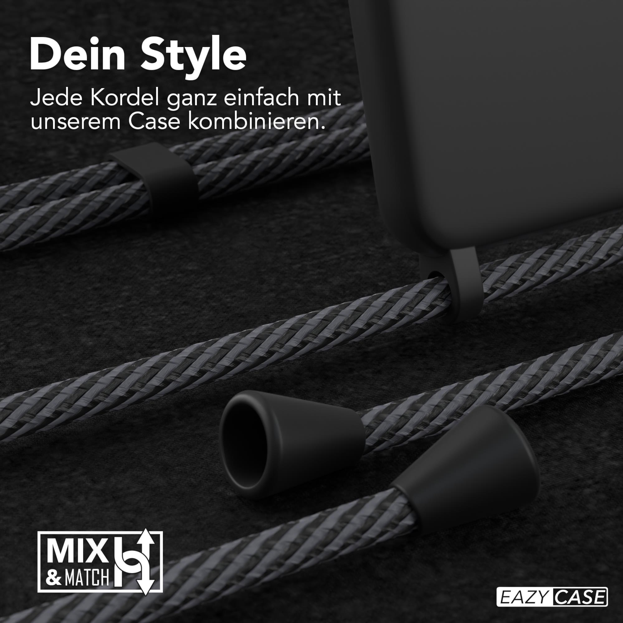 Nahaufnahme einer Handyhülle mit befestigtem Schlüsselband, zeigt eine strukturierte Oberfläche.