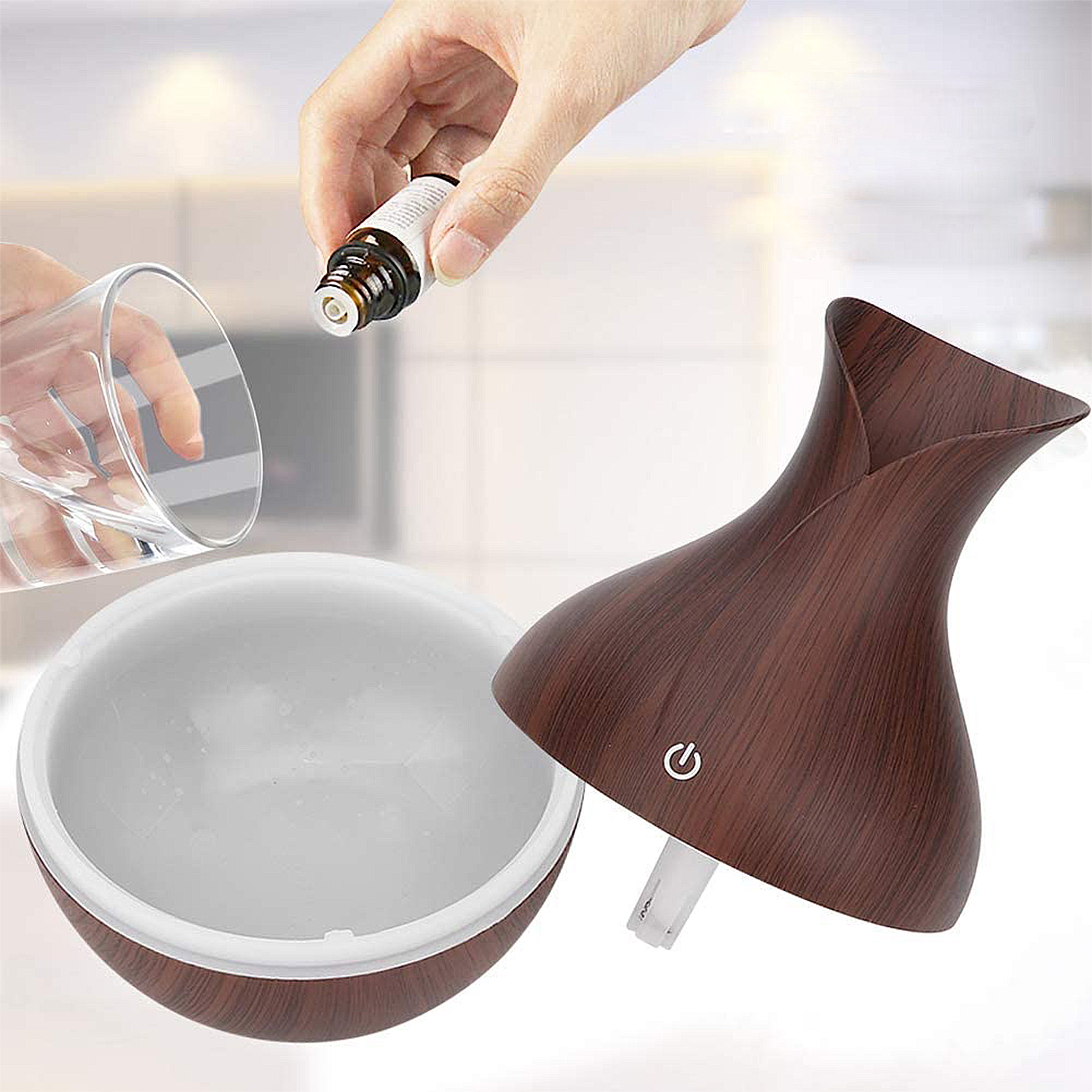 Ein offener Diffusor mit einem Glas Wasser und einer Ölflasche.