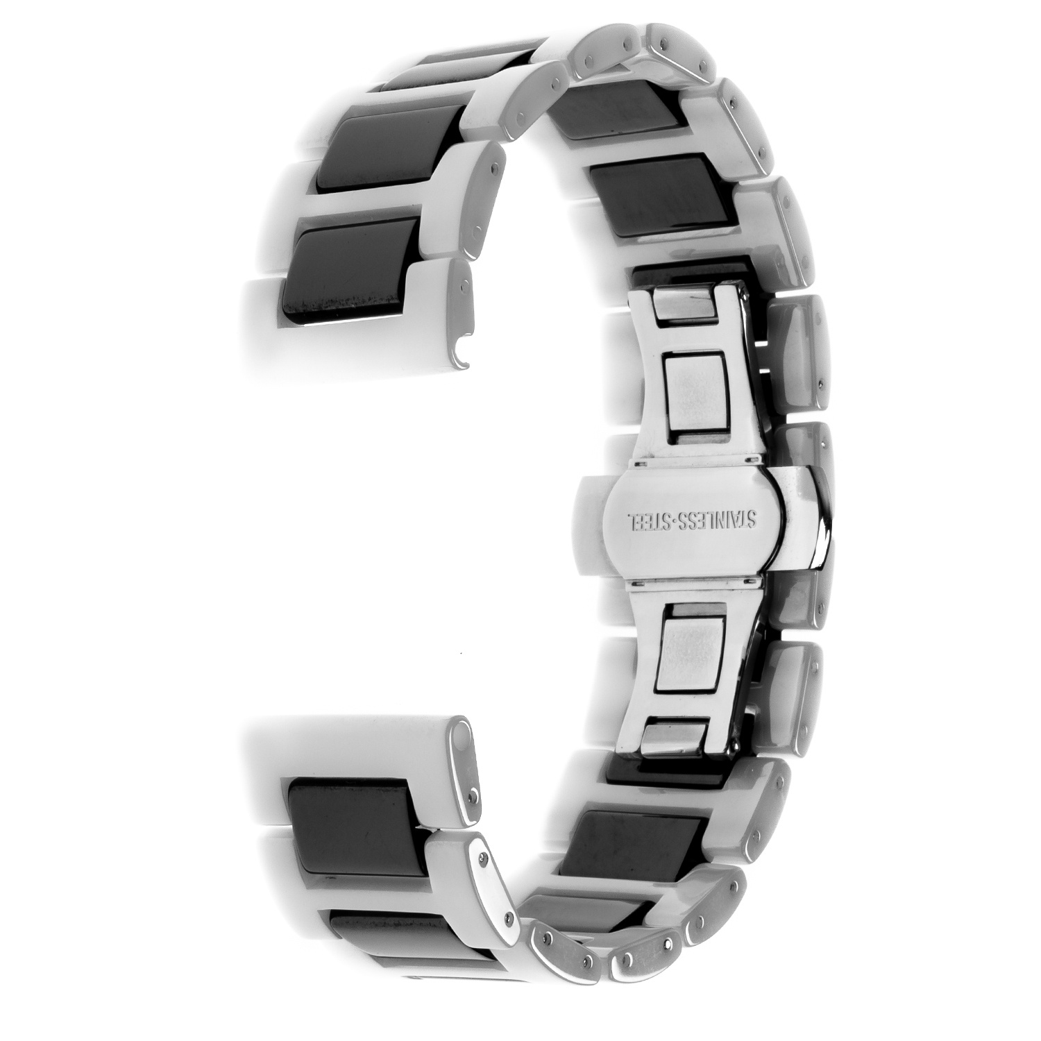 Una correa de reloj hecha de eslabones rectangulares blancos y negros, con un cierre plateado. La banda está curvada.