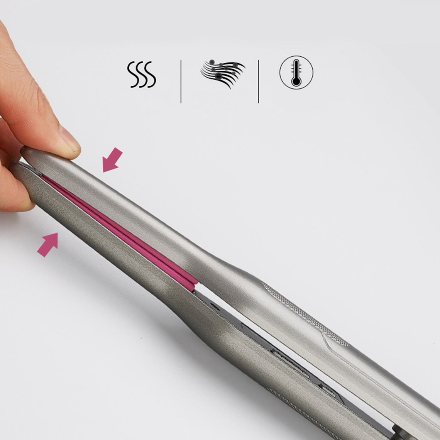 Piastra per capelli argentata, interno rosa, mano che la tocca. Vengono mostrate icone di calore, vapore e flusso d'aria.