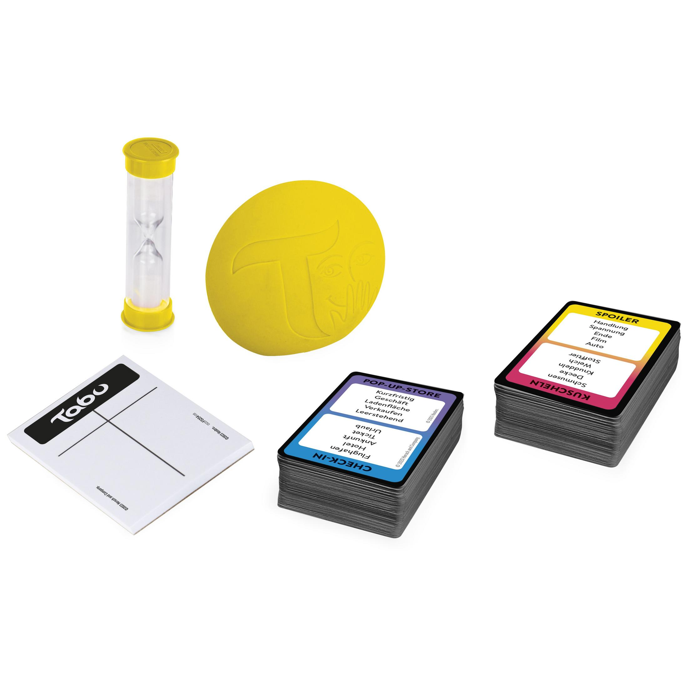 Zestaw gier Taboo z klepsydrą, żółtą piłką i stosami kart.