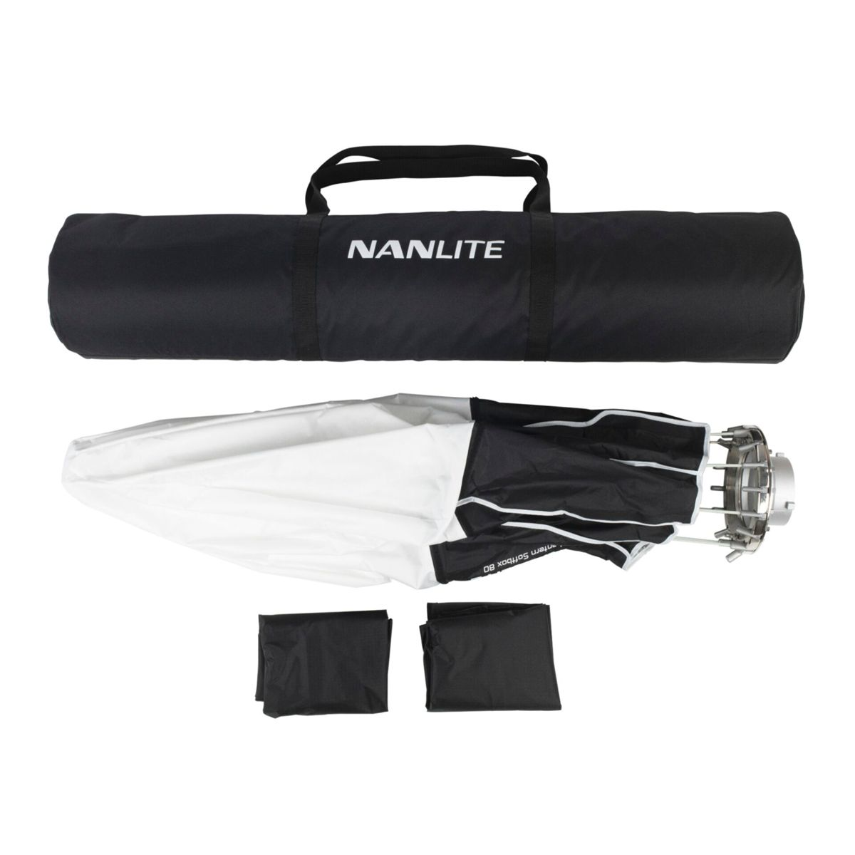 Borsa Nanlite, softbox bianco e nero piegato e due piccoli pezzi di tessuto nero piegati su sfondo bianco.