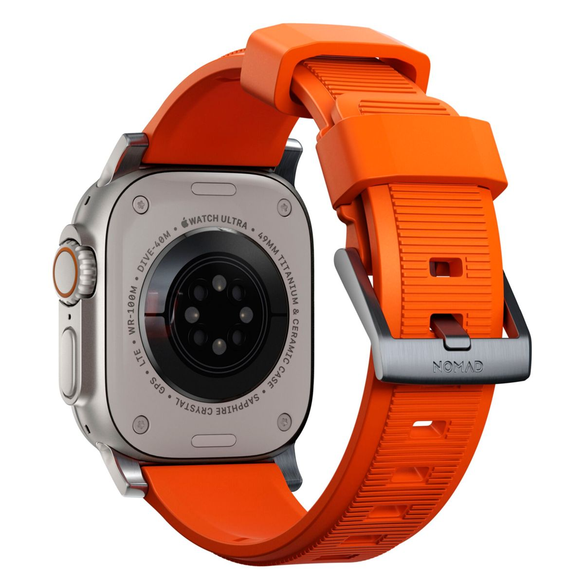 Apple Watch Ultra con correa naranja. Parte trasera del reloj visible, mostrando detalles y la marca Nomad.