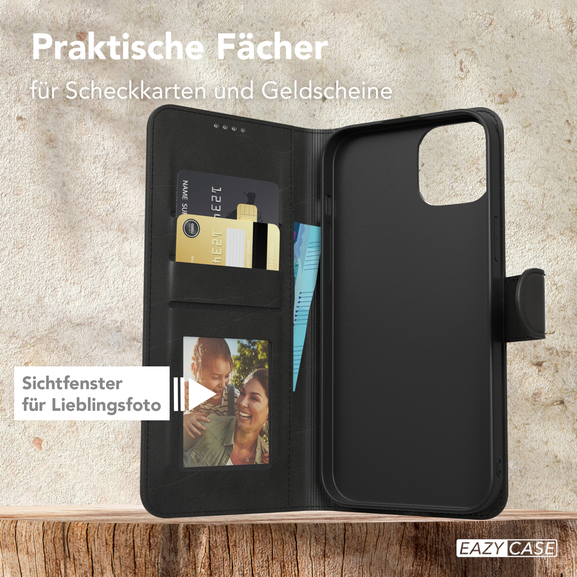 Geöffnete schwarze Handyhülle mit Kartenfächern, einem Foto und einem Magnetverschluss auf Holz.