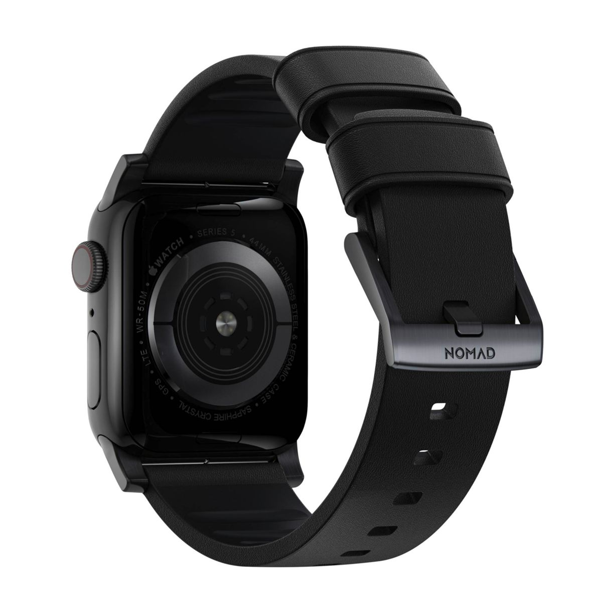 Schwarze Apple Watch mit schwarzem Armband. Das Armband hat eine Schnalle mit dem Wort NOMAD.