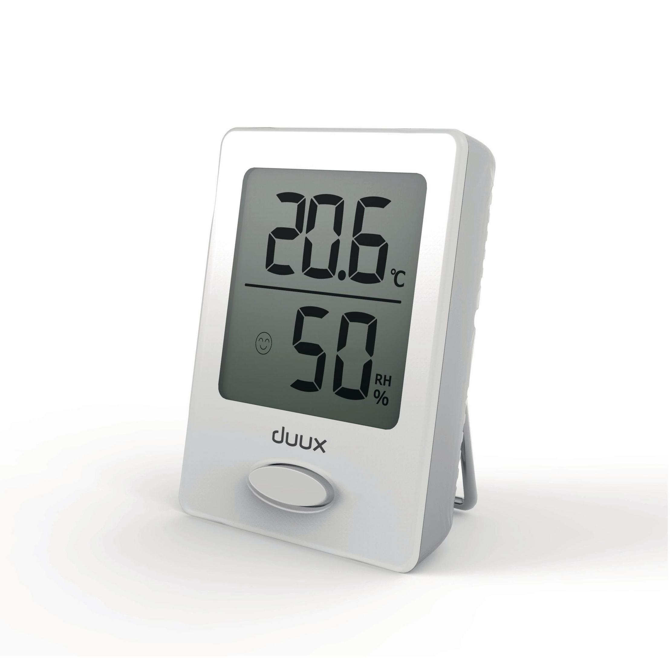 Ein weißes digitales Thermometer mit Anzeige von 20,6°C und 50%. Es hat einen kleinen Fuß.