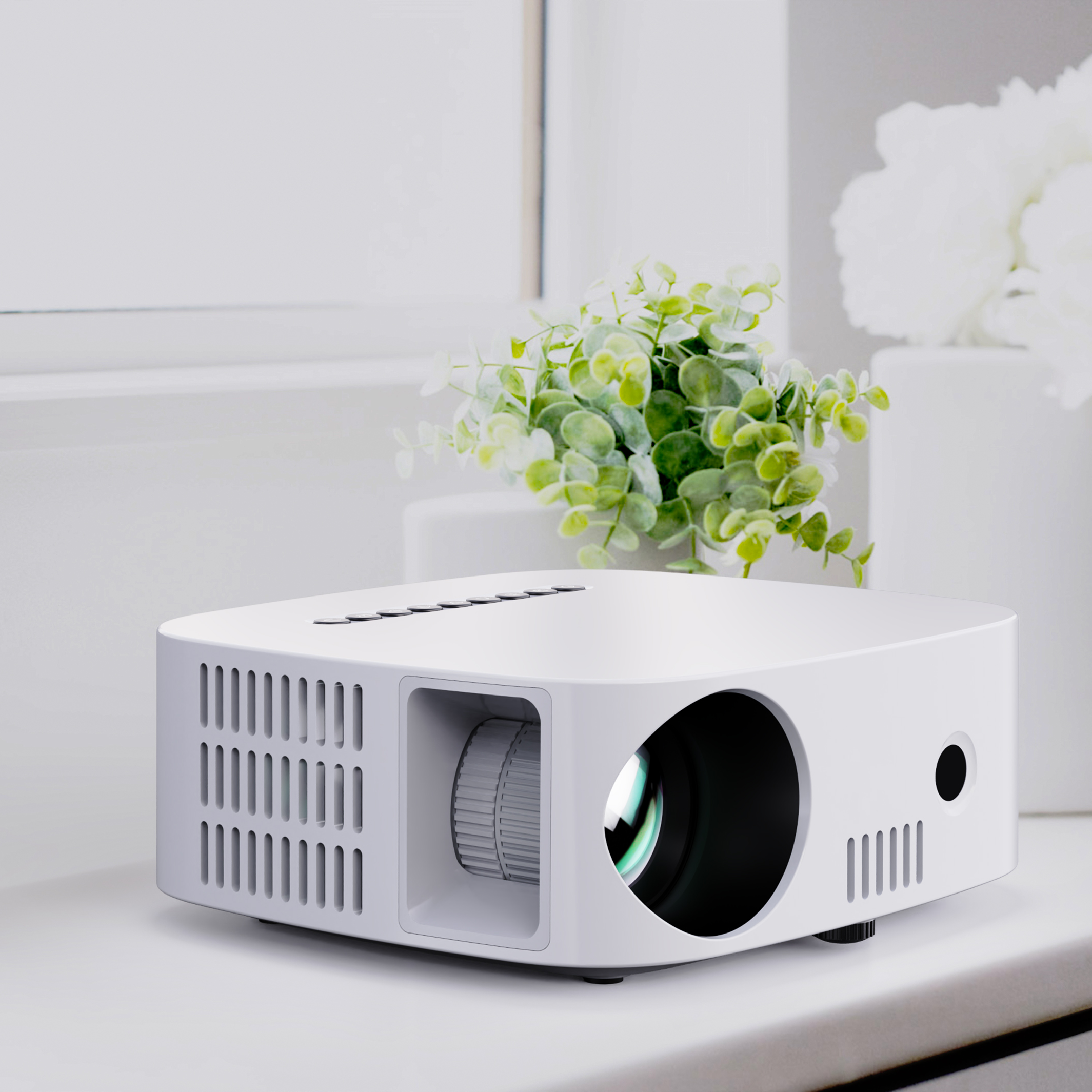 Witte projector op een tafel met een plant en bloemen op de achtergrond.