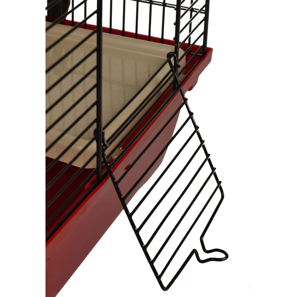 Ein rot-schwarzer Käfig für Haustiere, mit einer Leiter, die zum oberen Teil führt.