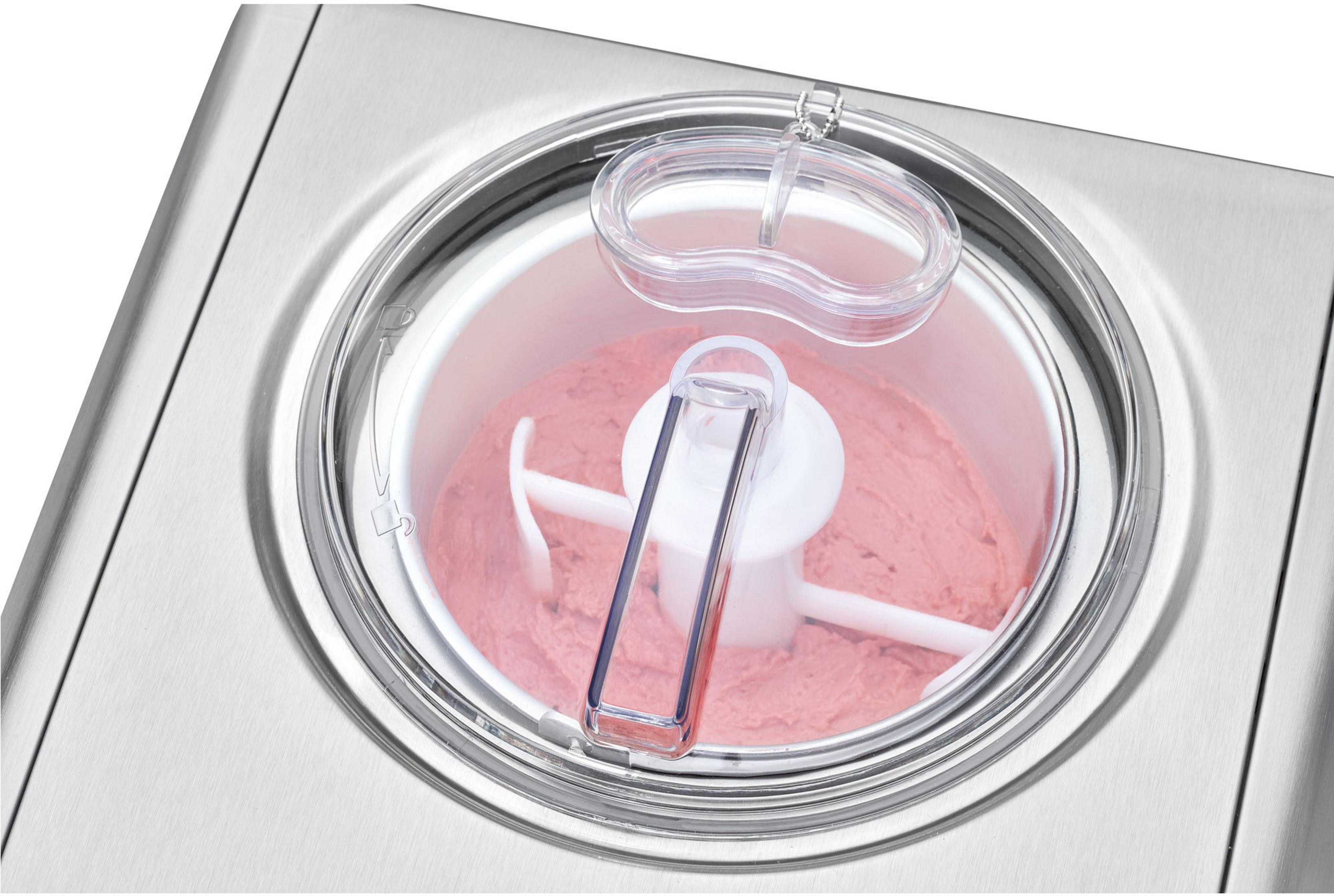 Eine Eismaschine mit rosa Eis im Inneren. Die Oberseite ist klar und die Maschine ist silbern.