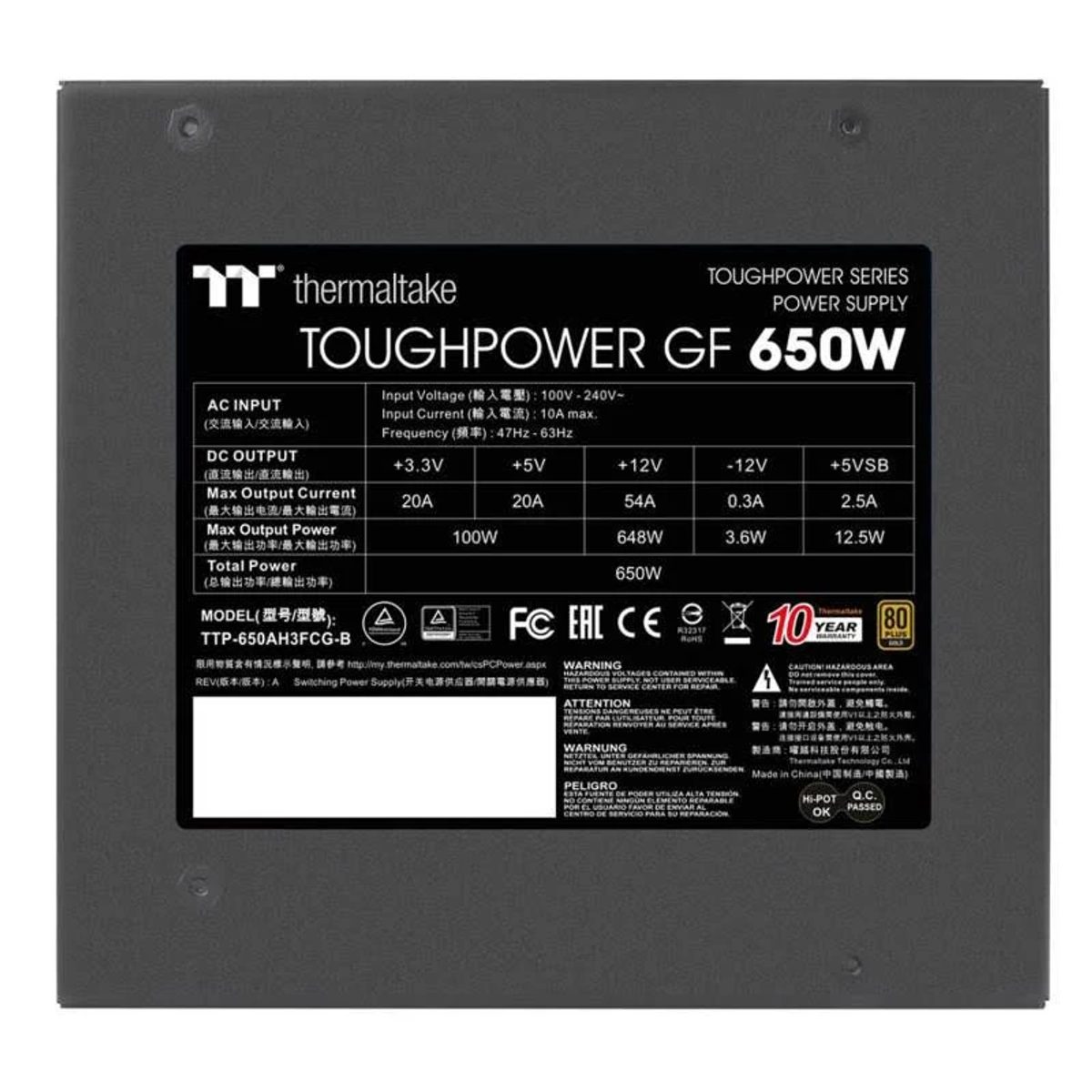 Czarny i szary zasilacz (PSU) z etykietami. Posiada wentylator i różne porty.