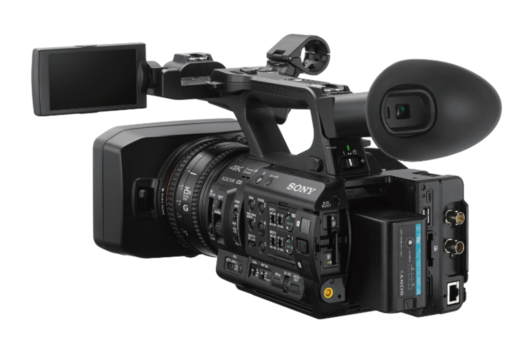 Videocamera professionale nera. Vista laterale, obiettivo, display e pulsanti.