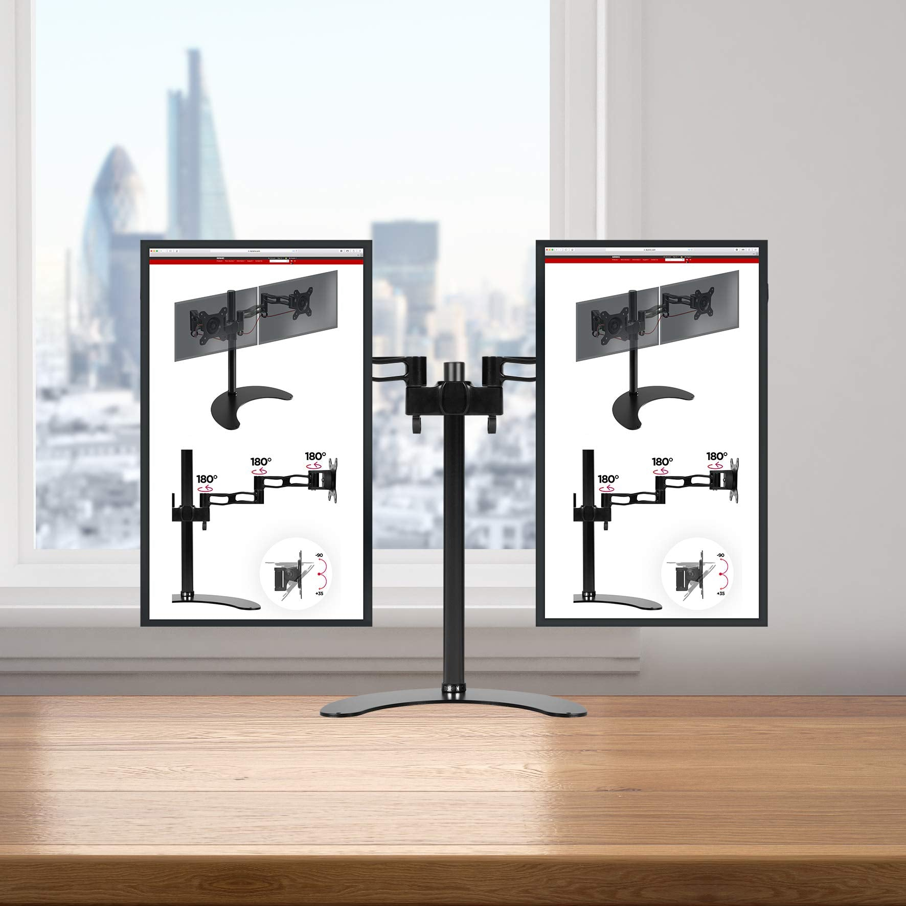 Zwei Monitore mit Schreibtischhalterungen, die Bildschirmdiagramme zeigen, auf einem Holztisch.