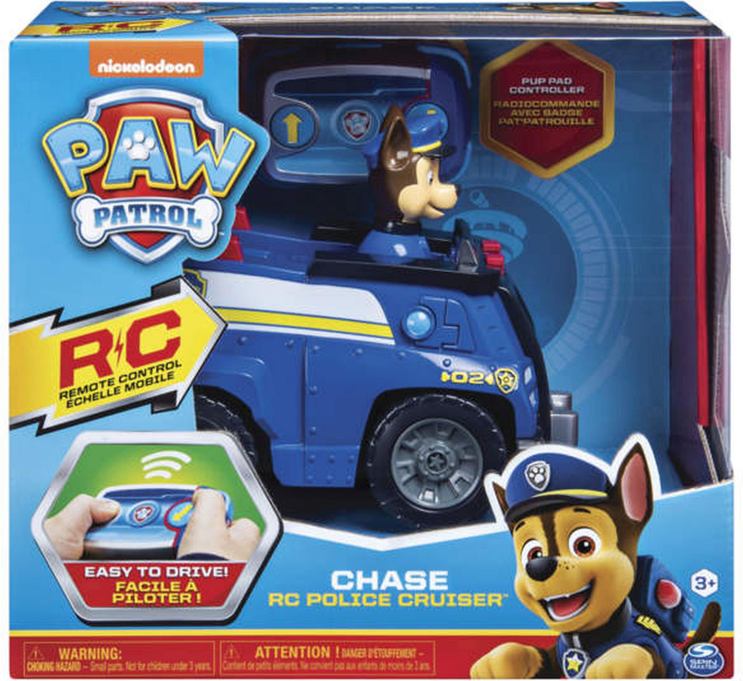 Coche patrulla policial Paw Patrol en caja. Figura de Chase en el coche. Mando a distancia.