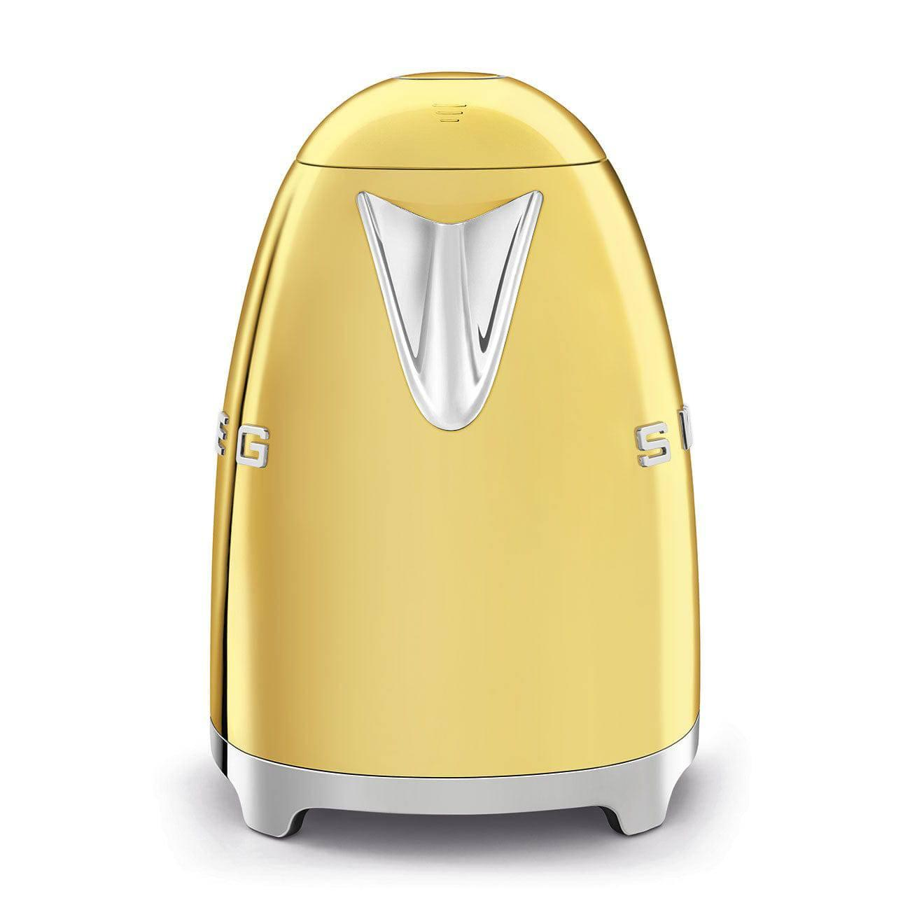 Gold-colored electric kettle with a silver spout, set against a white background. The kettle shows the brand name.