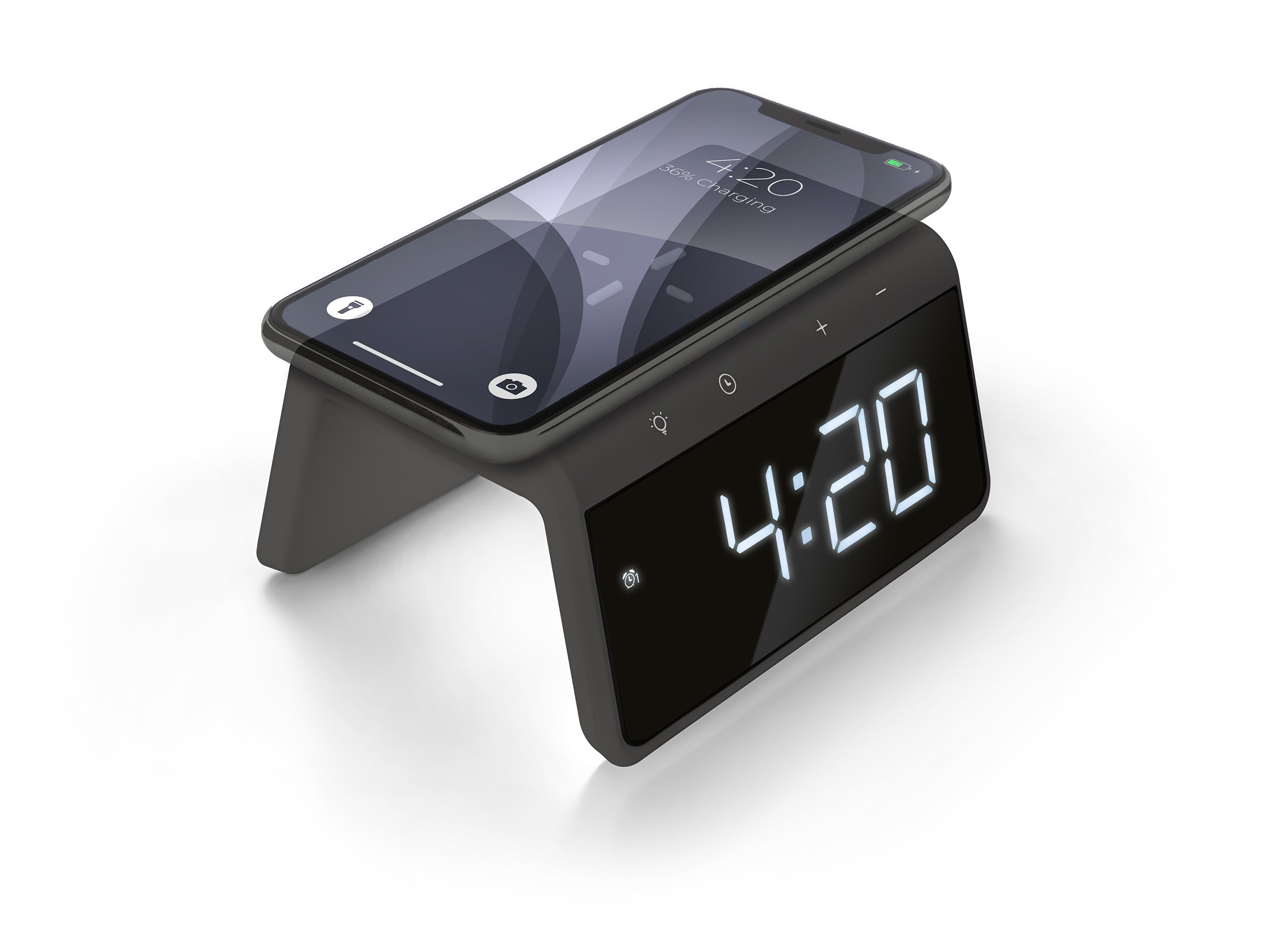 Black alarm clock with a smartphone charging on top. The time displayed is 4:20.