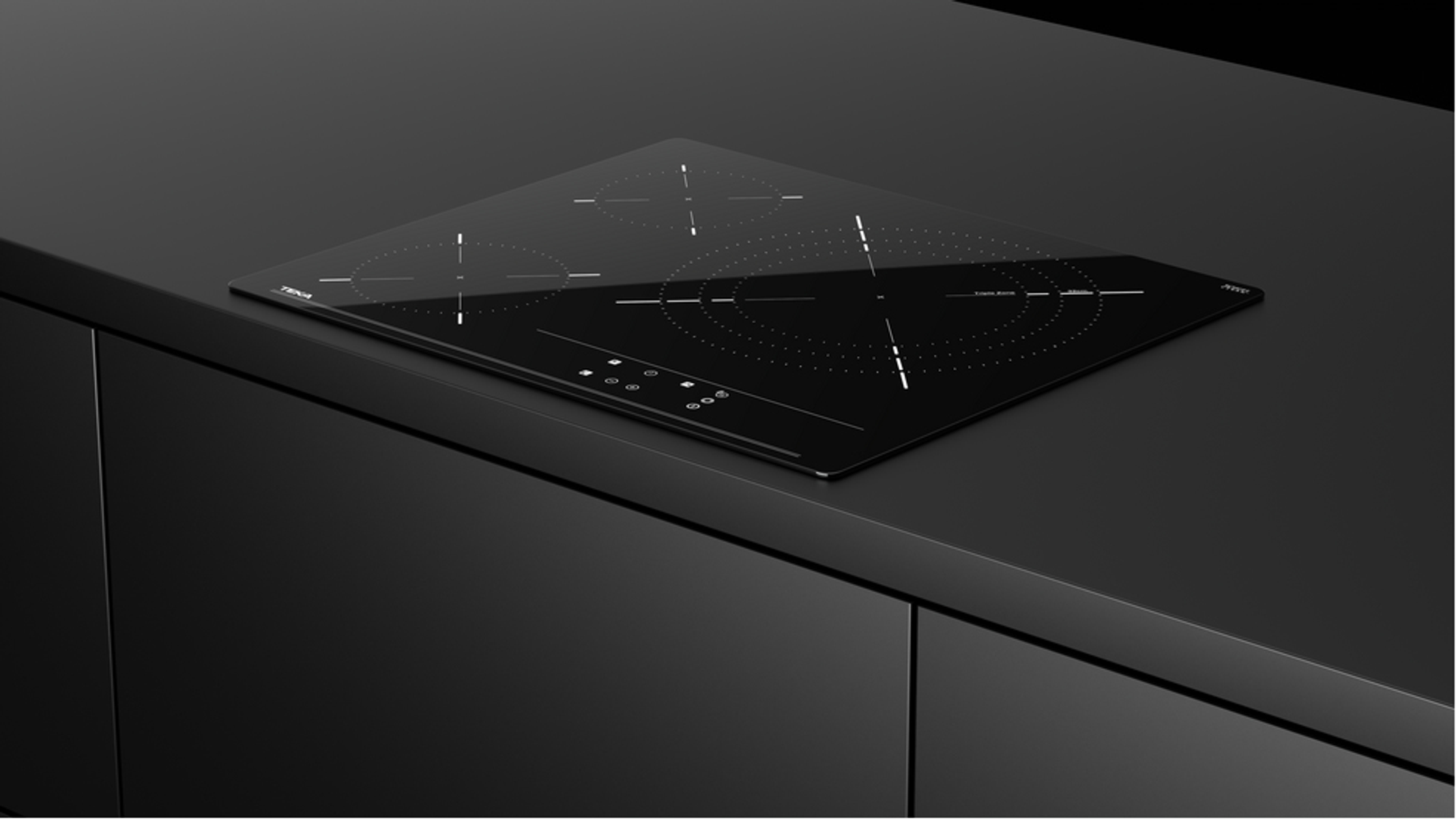 Czarna, wbudowana płyta indukcyjna na czarnym blacie. Posiada sterowanie dotykowe i elegancki design.