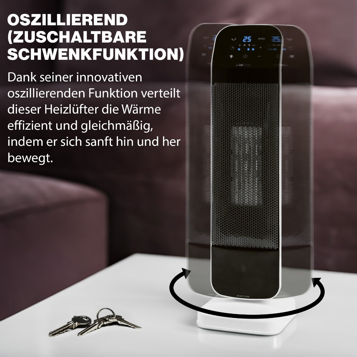 Czarno-biały grzejnik oscylacyjny z kluczami na białym stole.