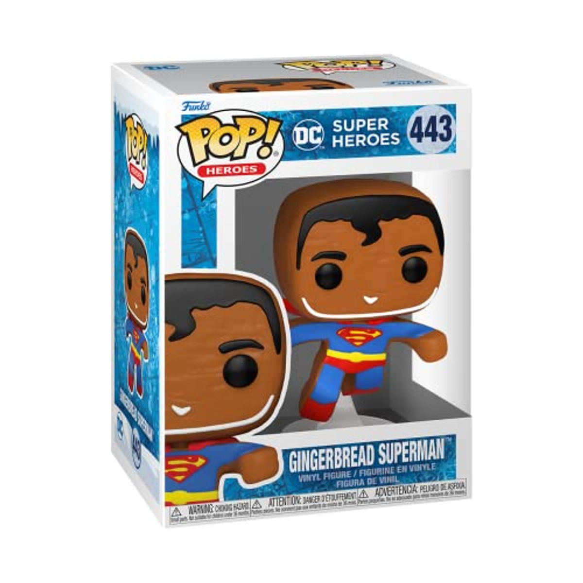 Figura Funko Pop in scatola di Gingerbread Superman, pelle marrone, costume blu e rosso.