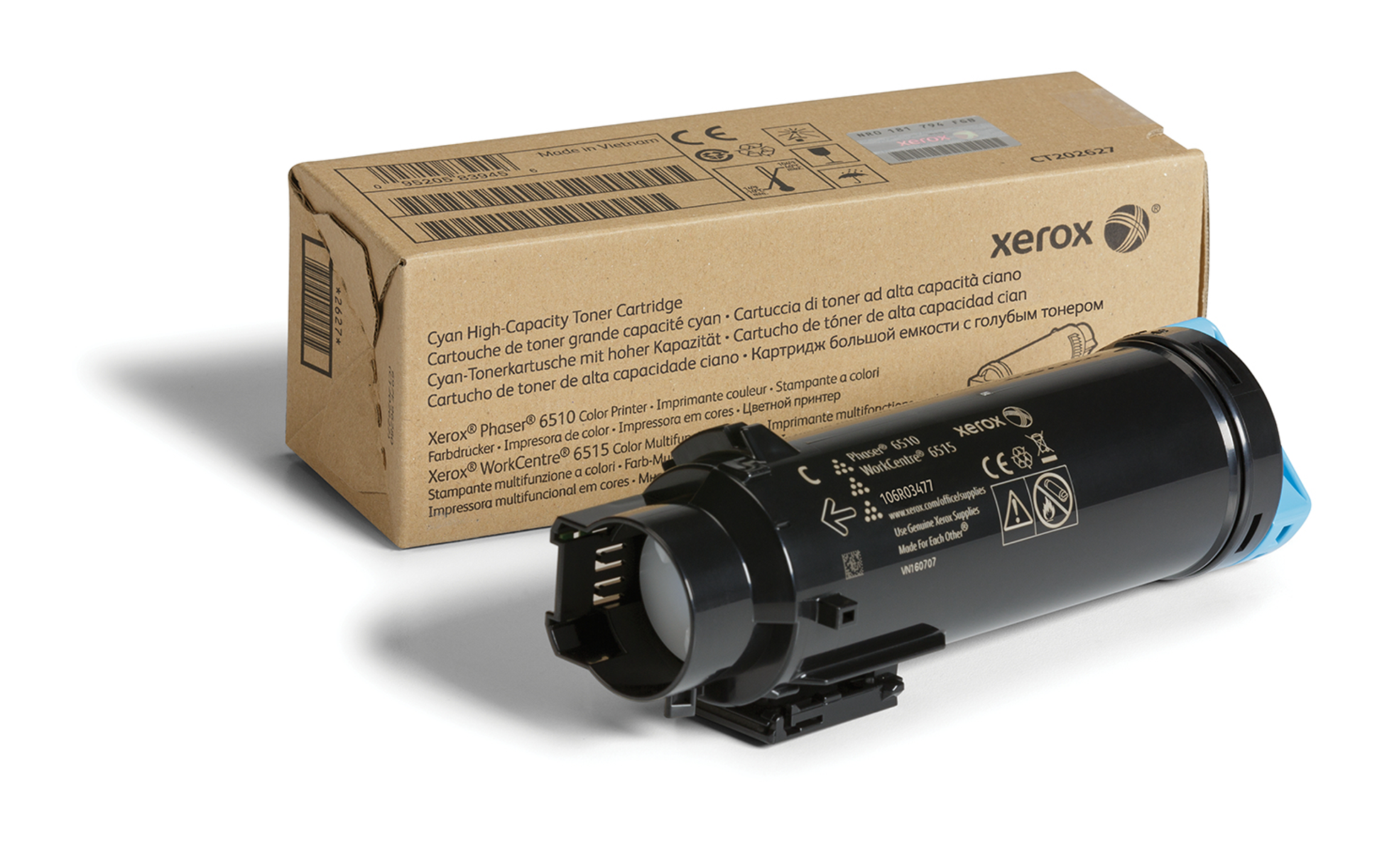 Cartuccia toner ciano Xerox e la sua scatola, su una superficie bianca.