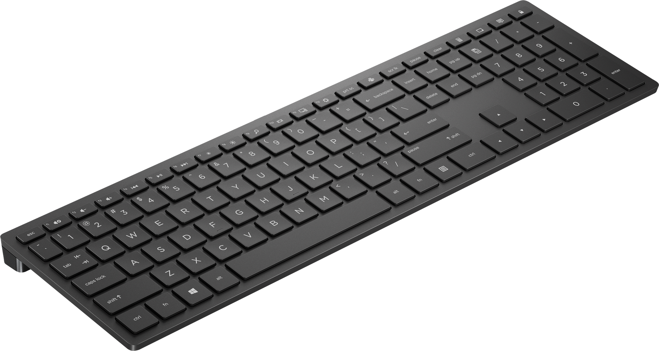Tastiera per computer nera con lettere e numeri bianchi. I tasti sono visibili.