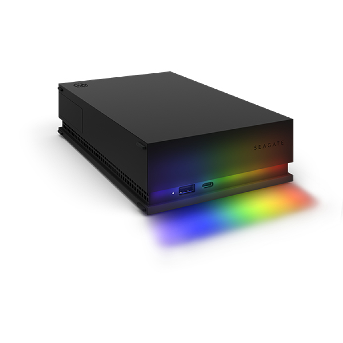 Disco rigido esterno Seagate nero con display a luce arcobaleno sul fondo, sfondo bianco.
