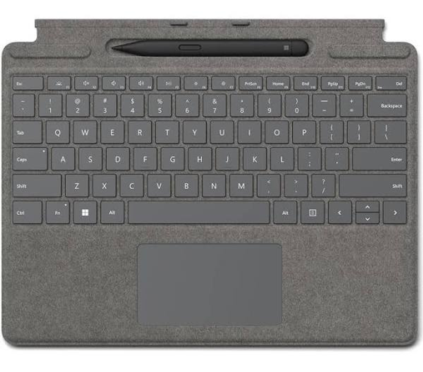Graue Tastatur mit Stift auf grauer Stoffoberfläche.