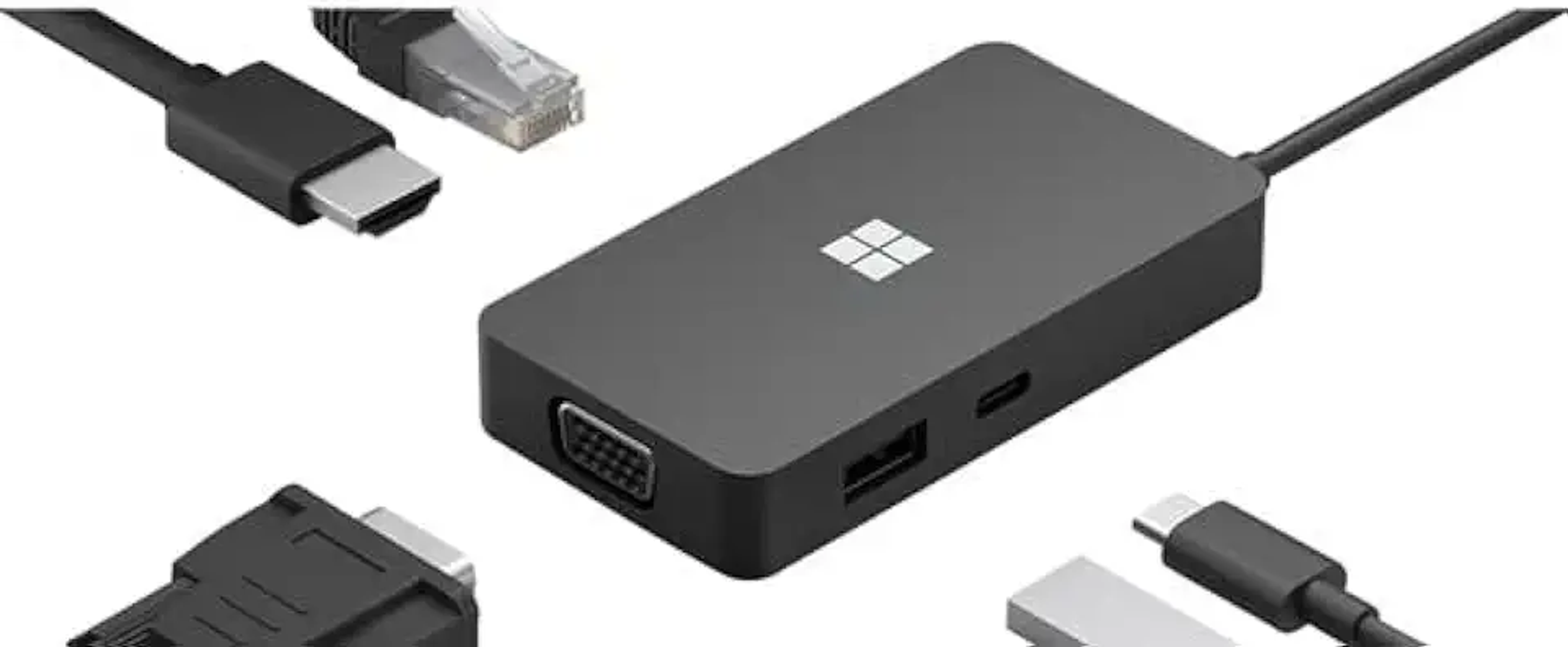 Schwarze Microsoft Surface Dock mit verschiedenen angeschlossenen Kabeln: HDMI, Ethernet, USB und mehr.